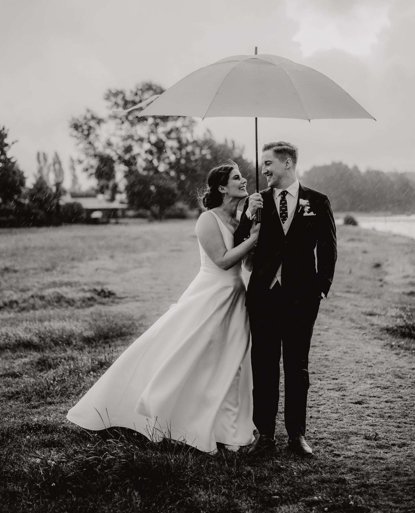 One of my favourite black and white photos of Jared and Alex in the pouring rain 🖤🤍⁠
⁠
#soovertherain #whereisoursummer #springwedding ⁠
#bopweddingphotographer #rotoruawedding #bopweddings #rotoruaweddingphotographer #nzbrideandgroom #nzwed #nzwed