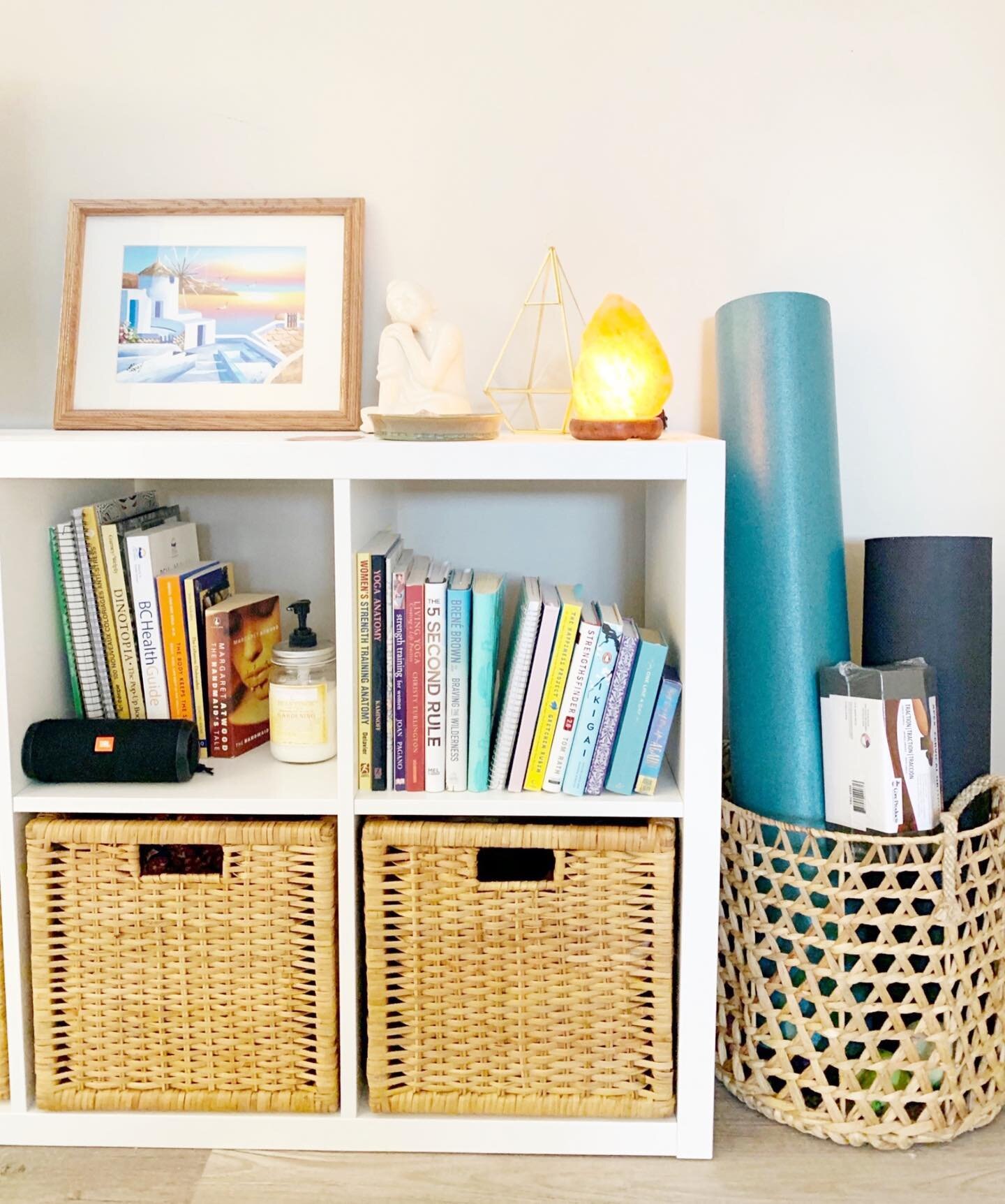 Good morning, 

A few years ago I helped my client to declutter, organize and decorate her space! Ive always loved looking back on this project, and especially this little yoga corner that we created for her to store her mats and supplies. Even the s