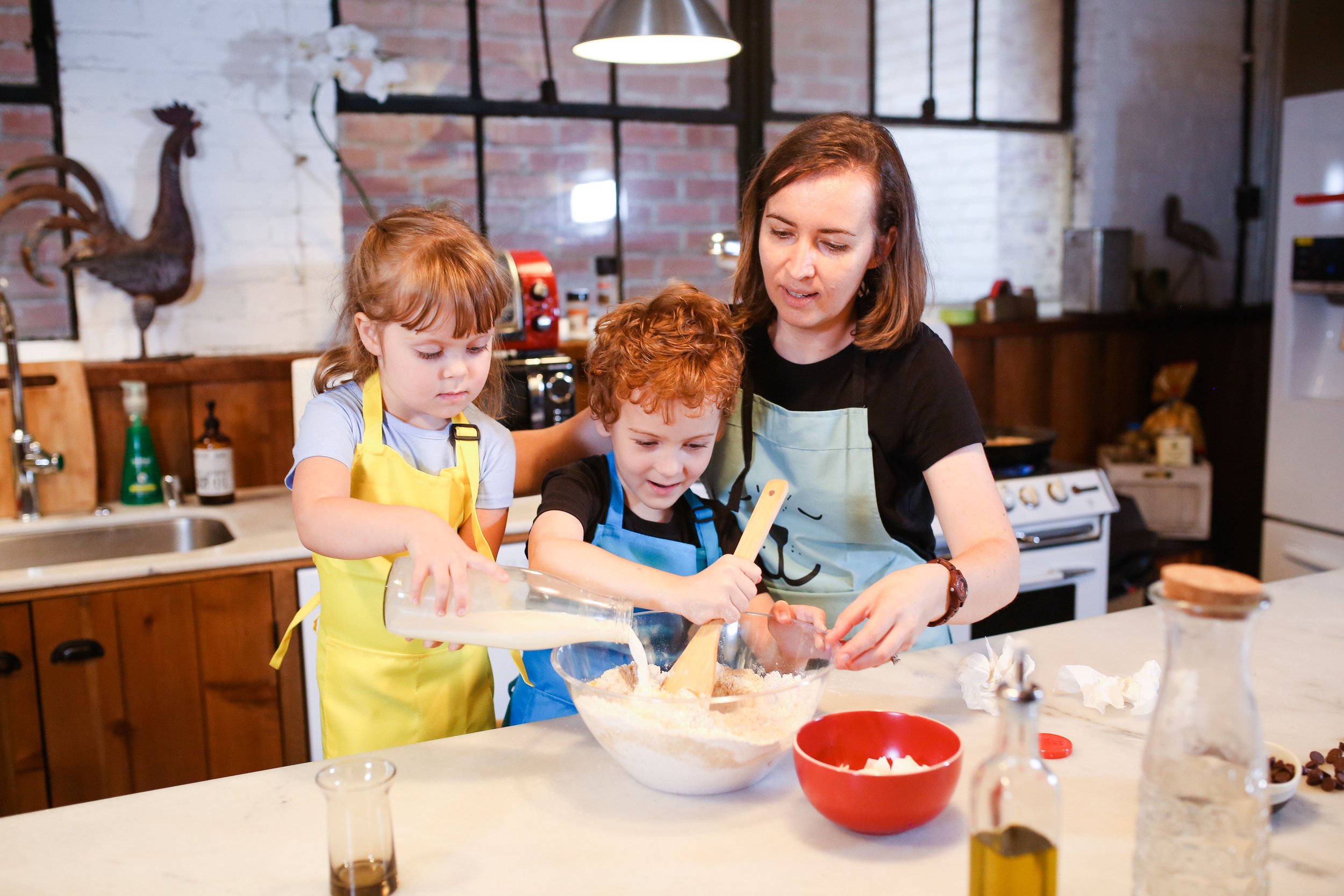 Mom cooking with her kids