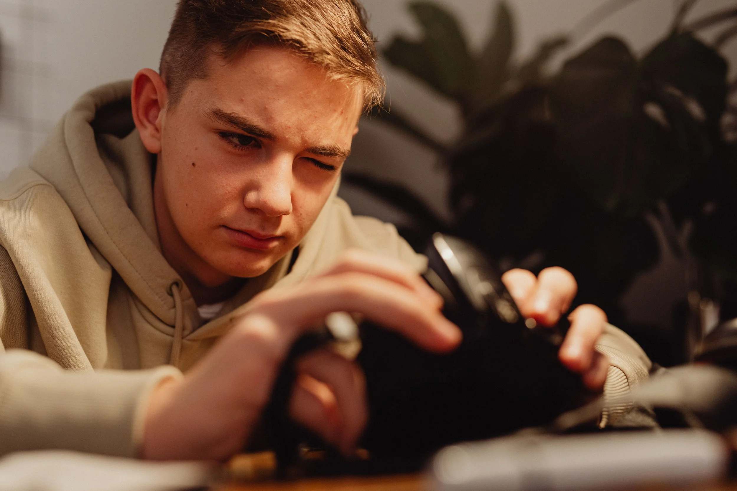 Person focused closely on a hands-on activity
