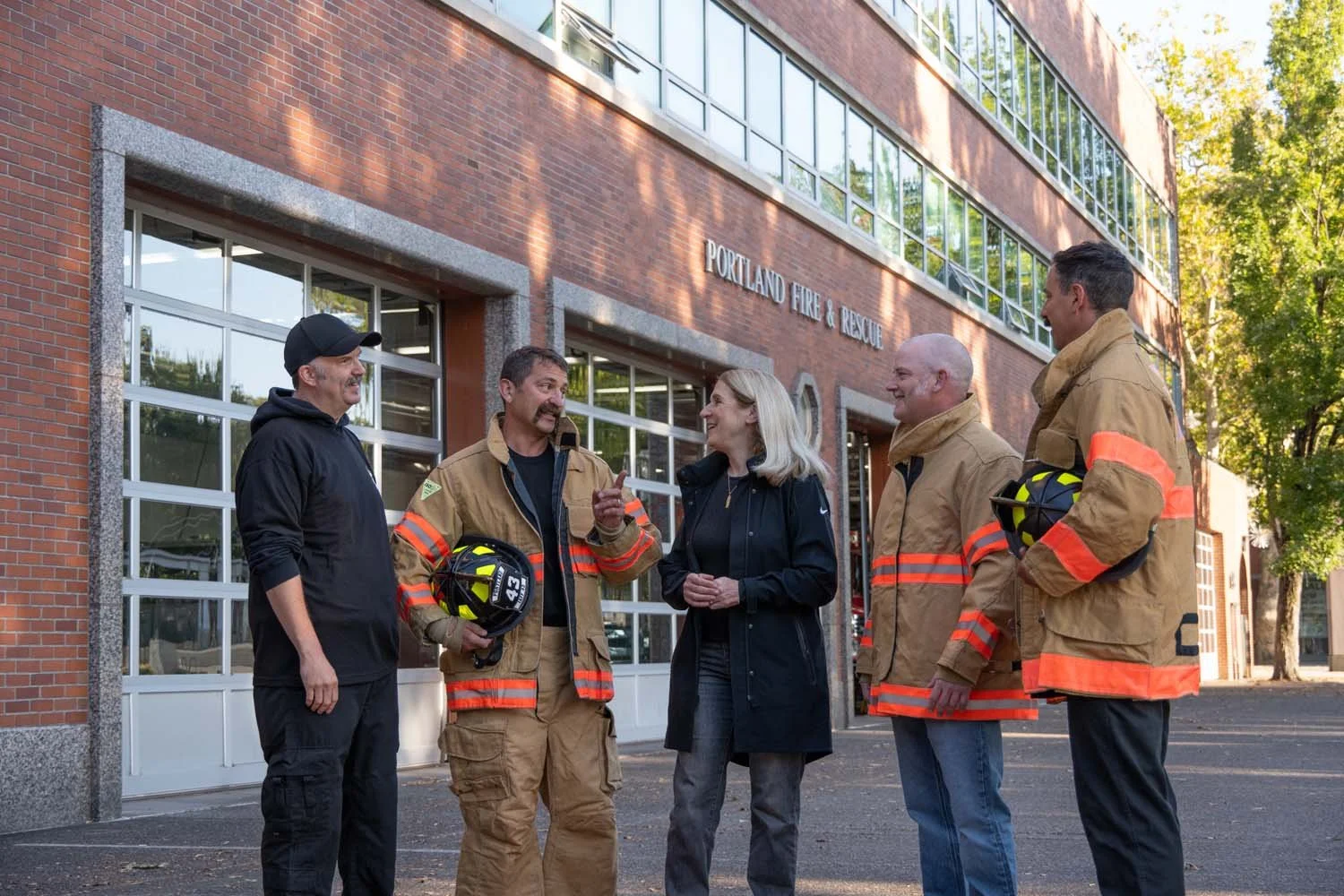 Julia Brim-Edwards with Firemen
