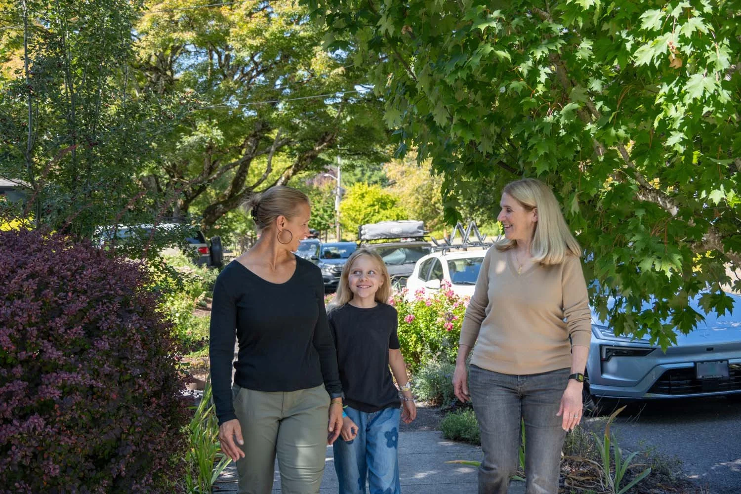 Julia Brim-Edwards walking with woman and daughter