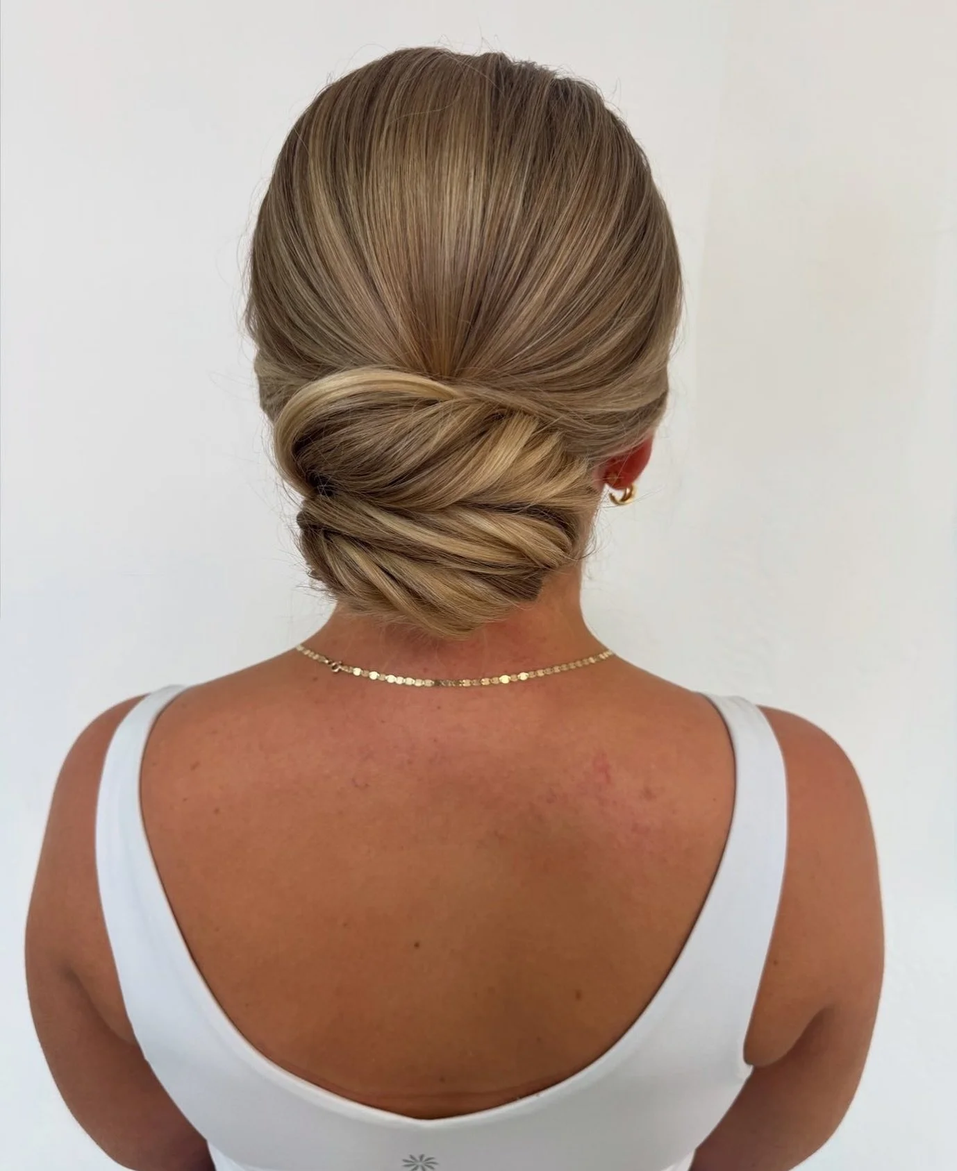 the kind of bun that makes you do a double take 😍 @tiffanyphamttp 

#teasetopleasehairandmakeup Bridal Hair. Bridal Updo. Sleek Updo. Modern Bun. Hair Inspo