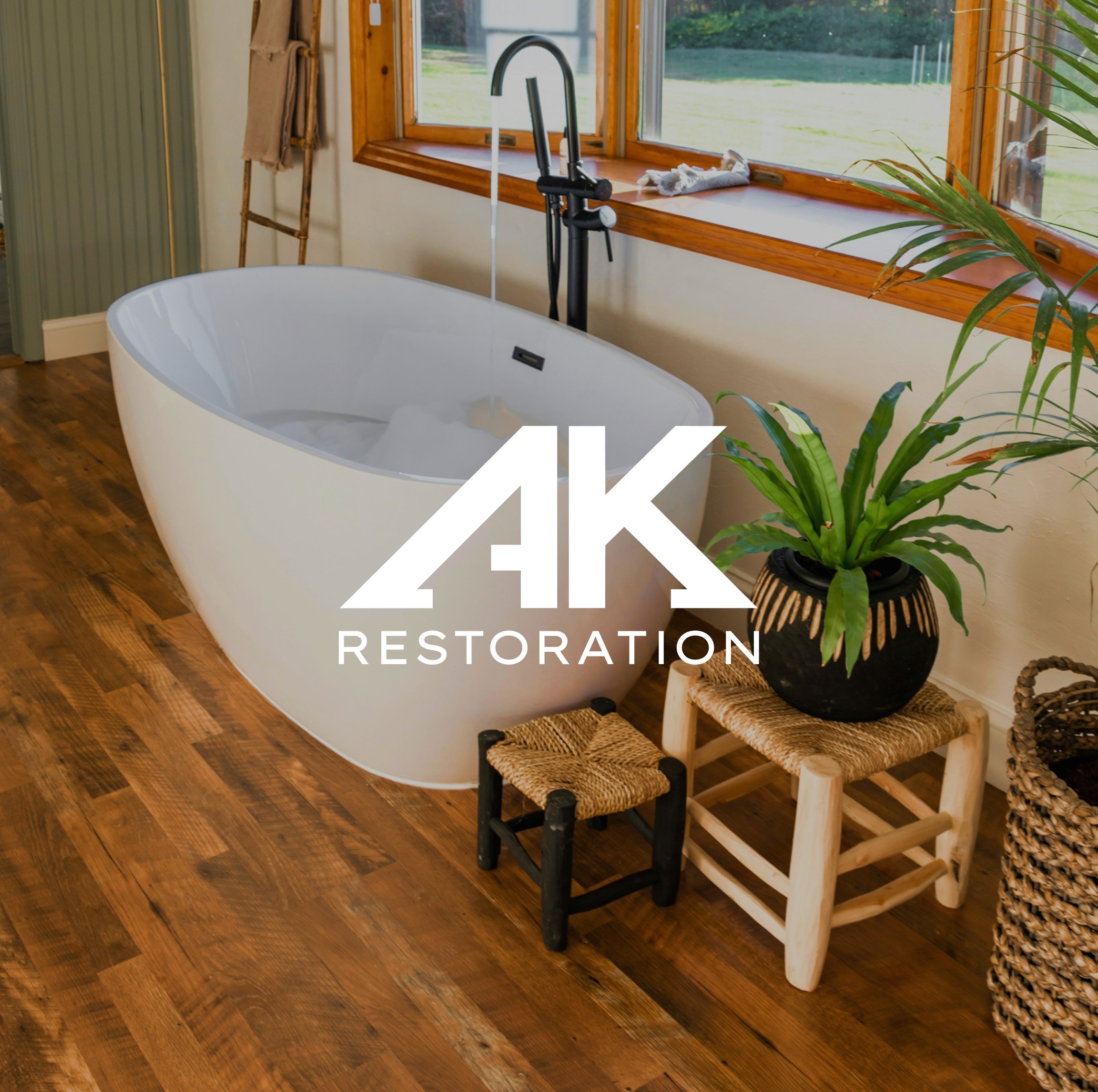 AK Restoration brand identity — warm, professional logo design for a construction and restoration company.