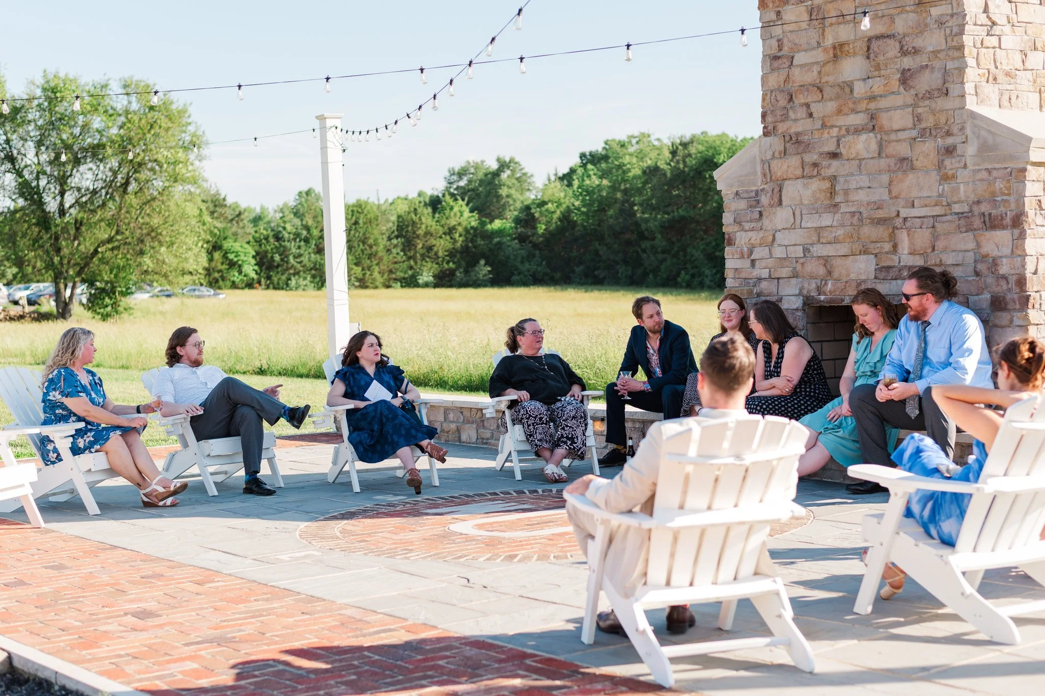 We love seeing our patio full of wedding guests relaxing and enjoying each other's company!

The outdoor patio is a great place for your guests to mingle, take in the views, relax in one of the Adirondack chairs, or later in the evening enjoy the glo