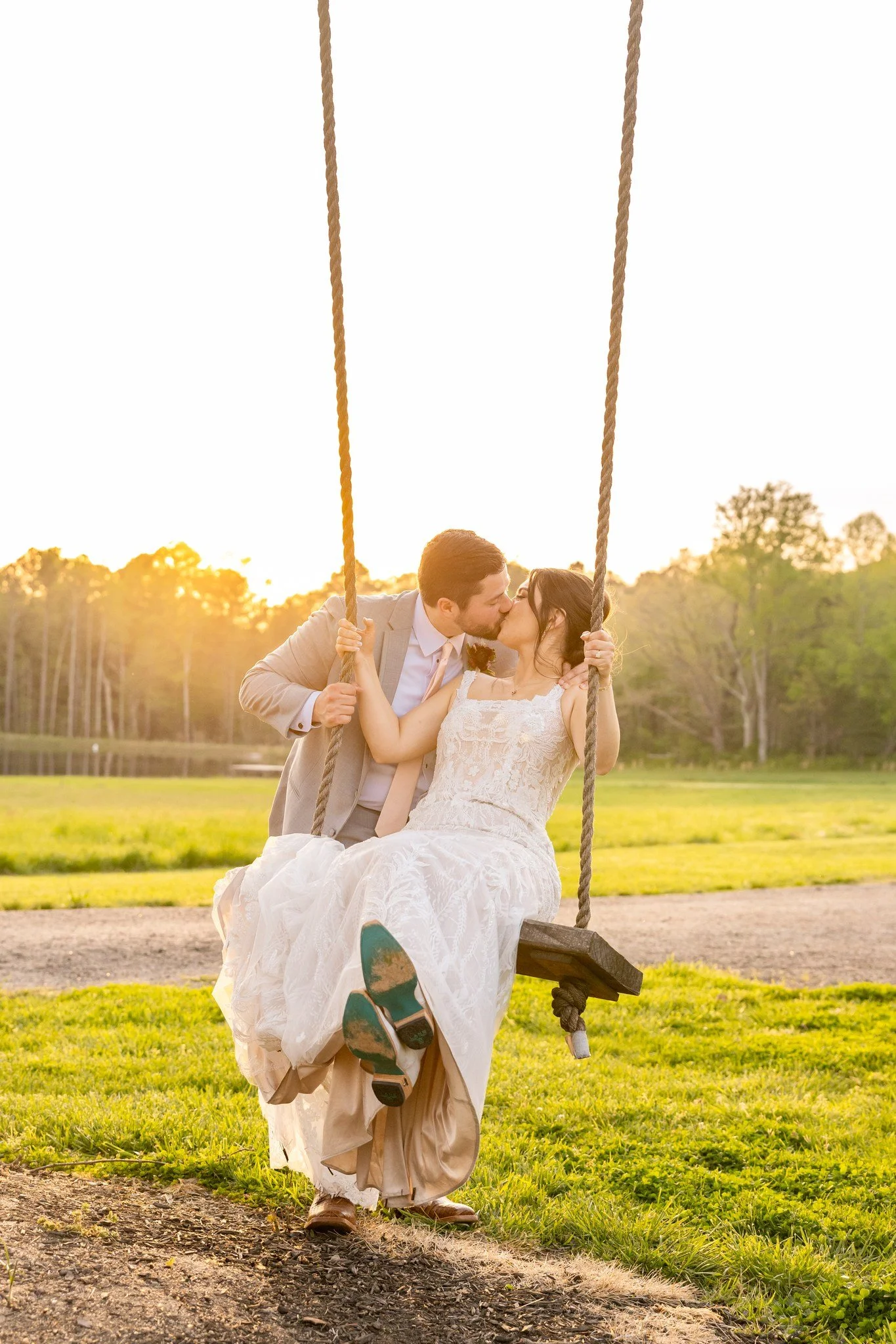 Congratulations to Claire &amp; Logan! 

There&rsquo;s something so timeless about a sunset moment on the rope swing&mdash;it&rsquo;s pure magic.  If you&rsquo;re newly engaged and dreaming of your own unforgettable day, we&rsquo;d love to show you a