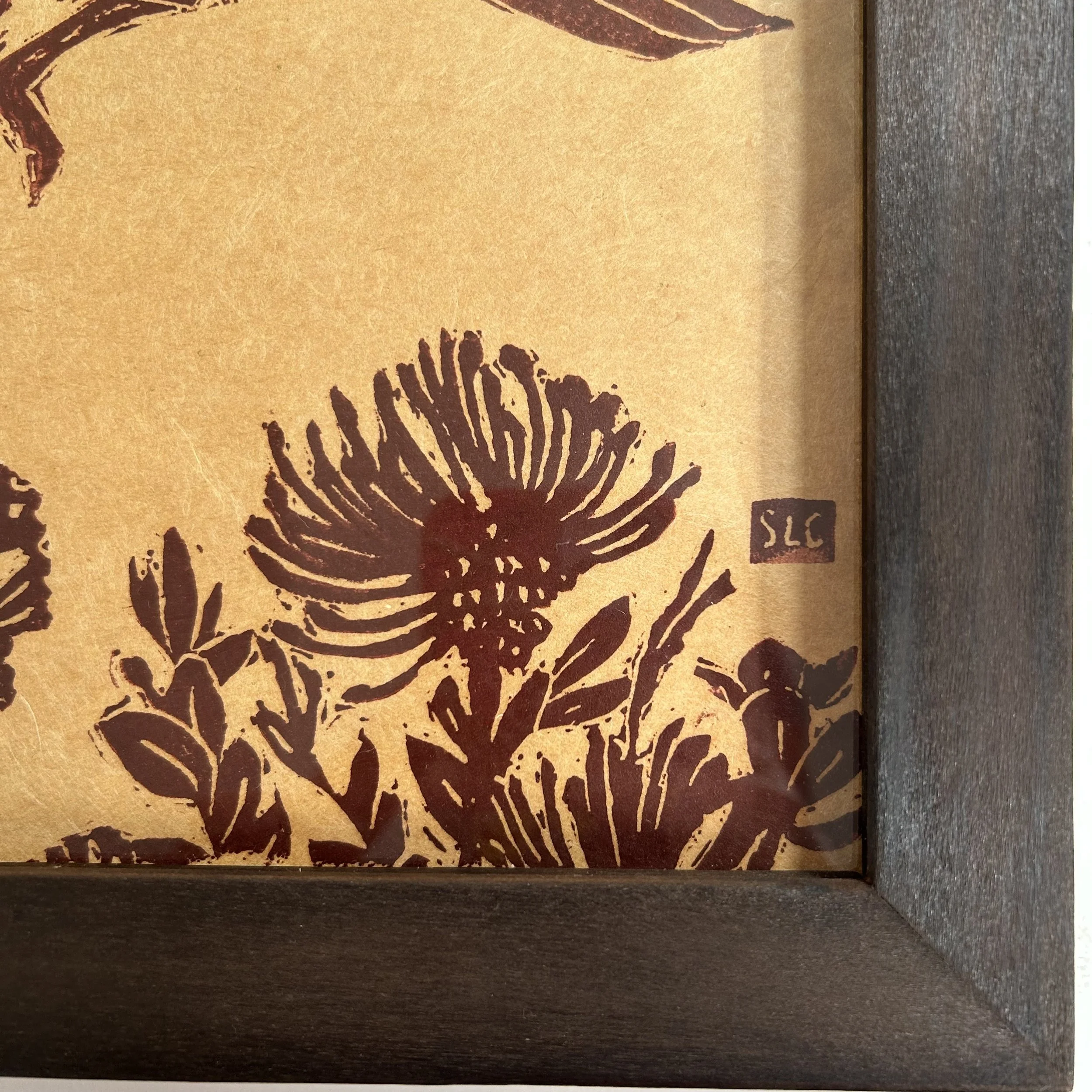 Iiwi in flight with Ohia Corner.jpg