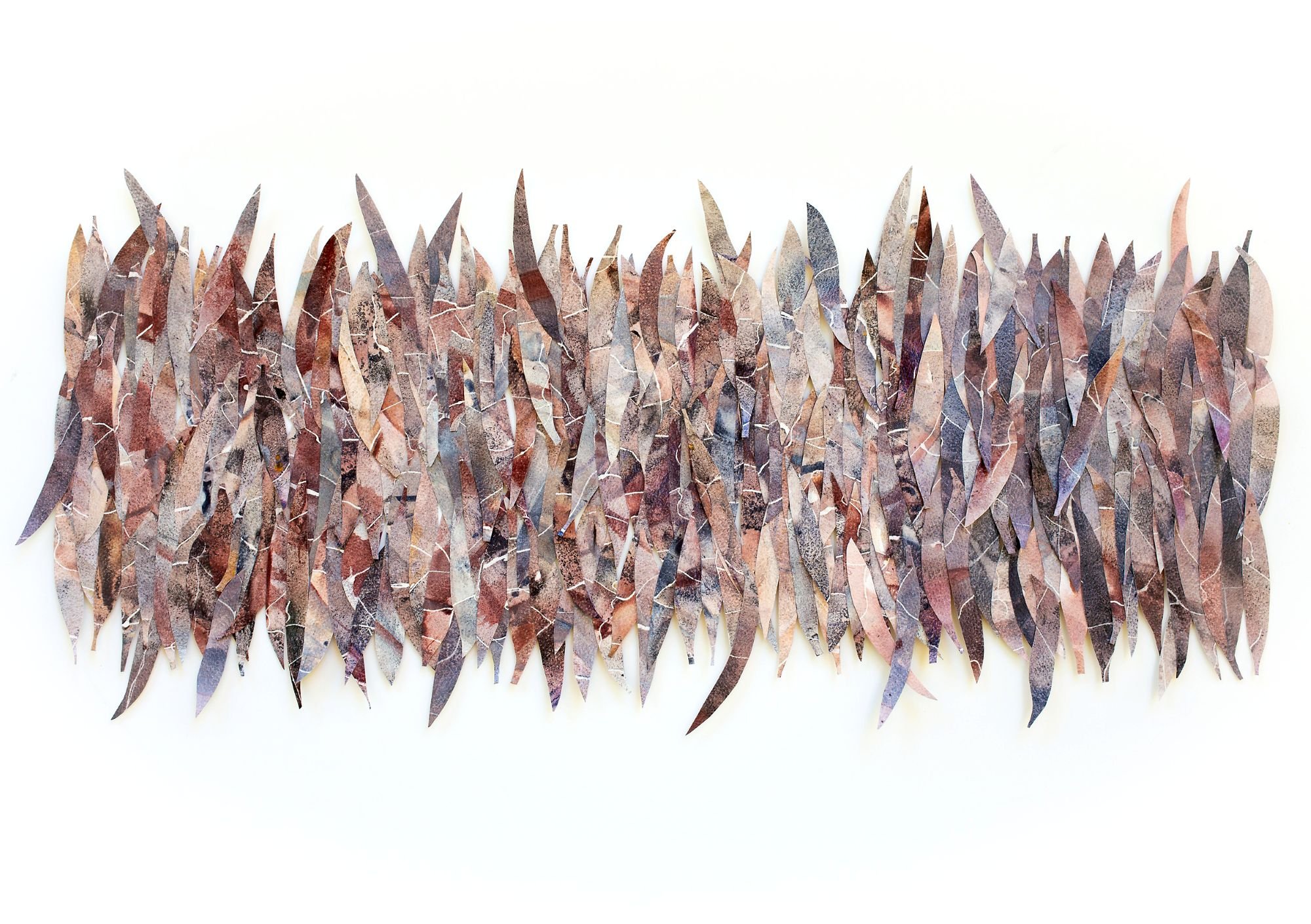 What Falls Feeds - paper sculpture of fallen gum leaves