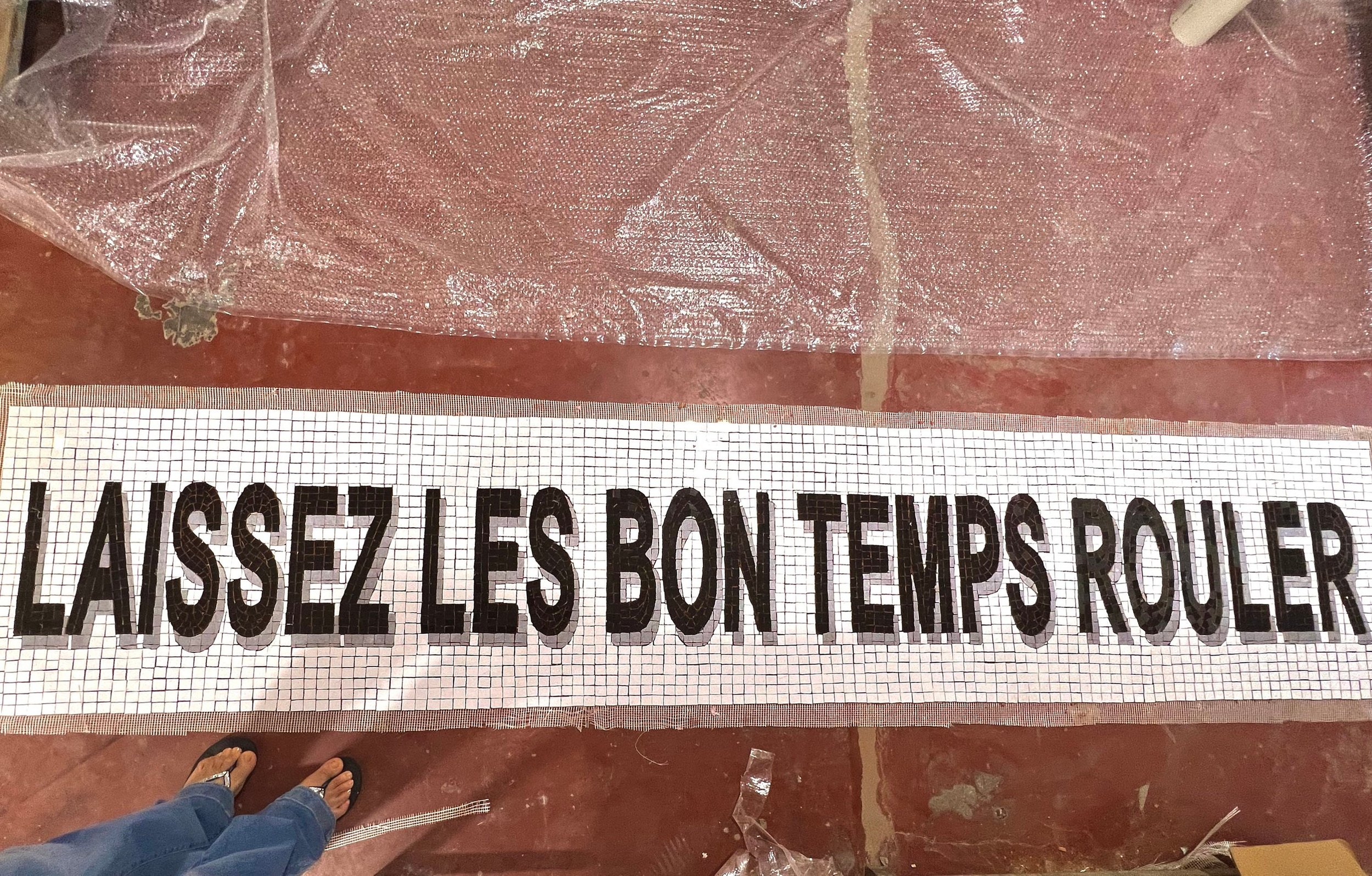 Special listing for Jason Hand cut Tile mosaic as per mock saying "Laissez le Bon Temps Rouler" on Mesh for Installation