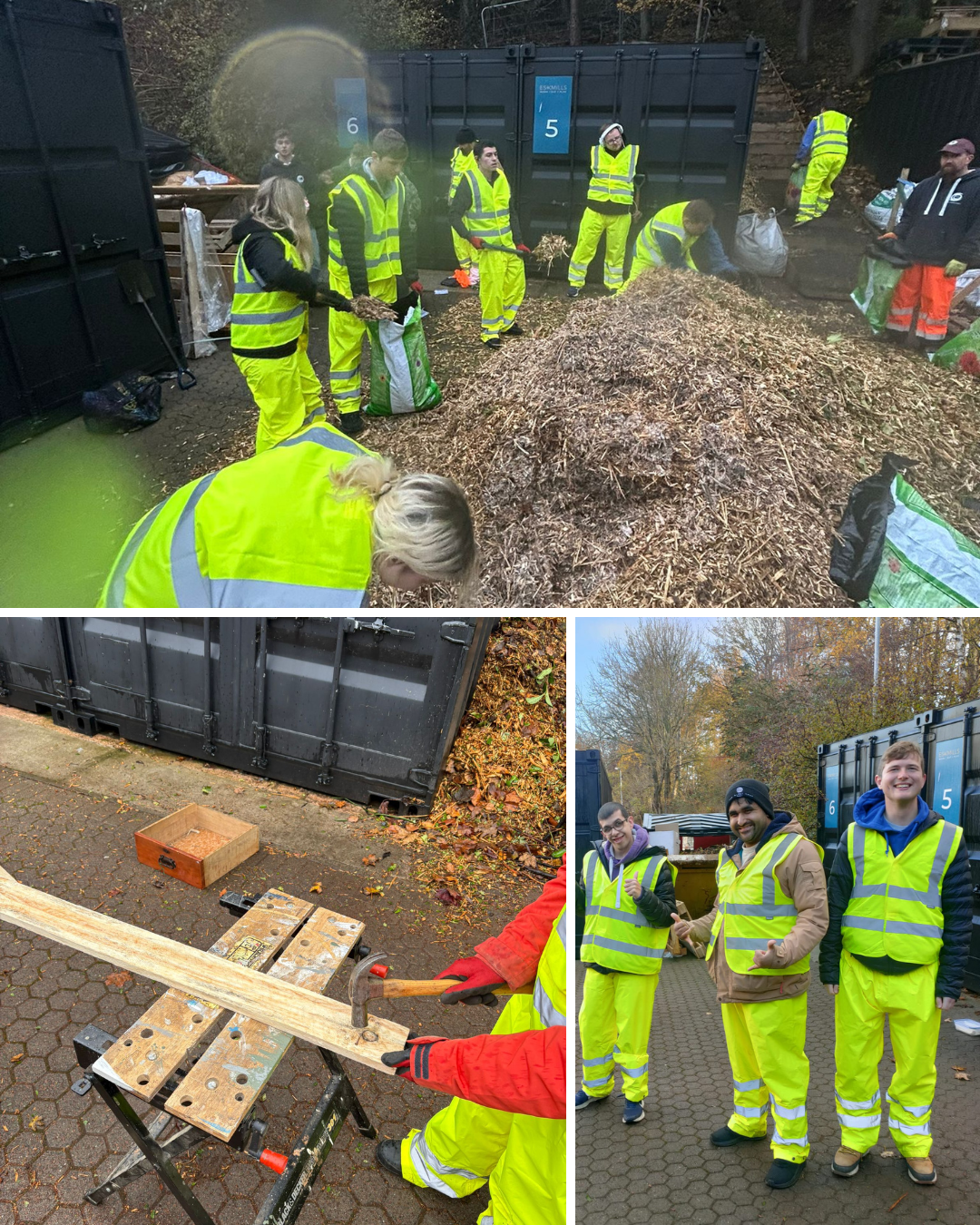 Group of people in high-visibility clothing working outdoors on a project, with one person hammering wood, others collecting materials, and some posing for the photo. There are large bins and a pile of wood chips.