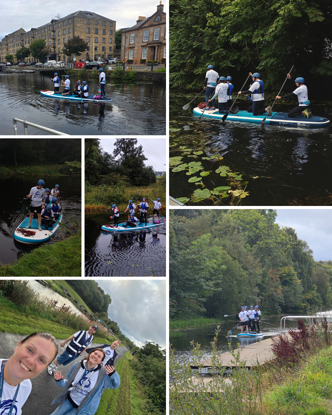 Group of people paddleboarding and walking near a canal, enjoying outdoor activities and nature.