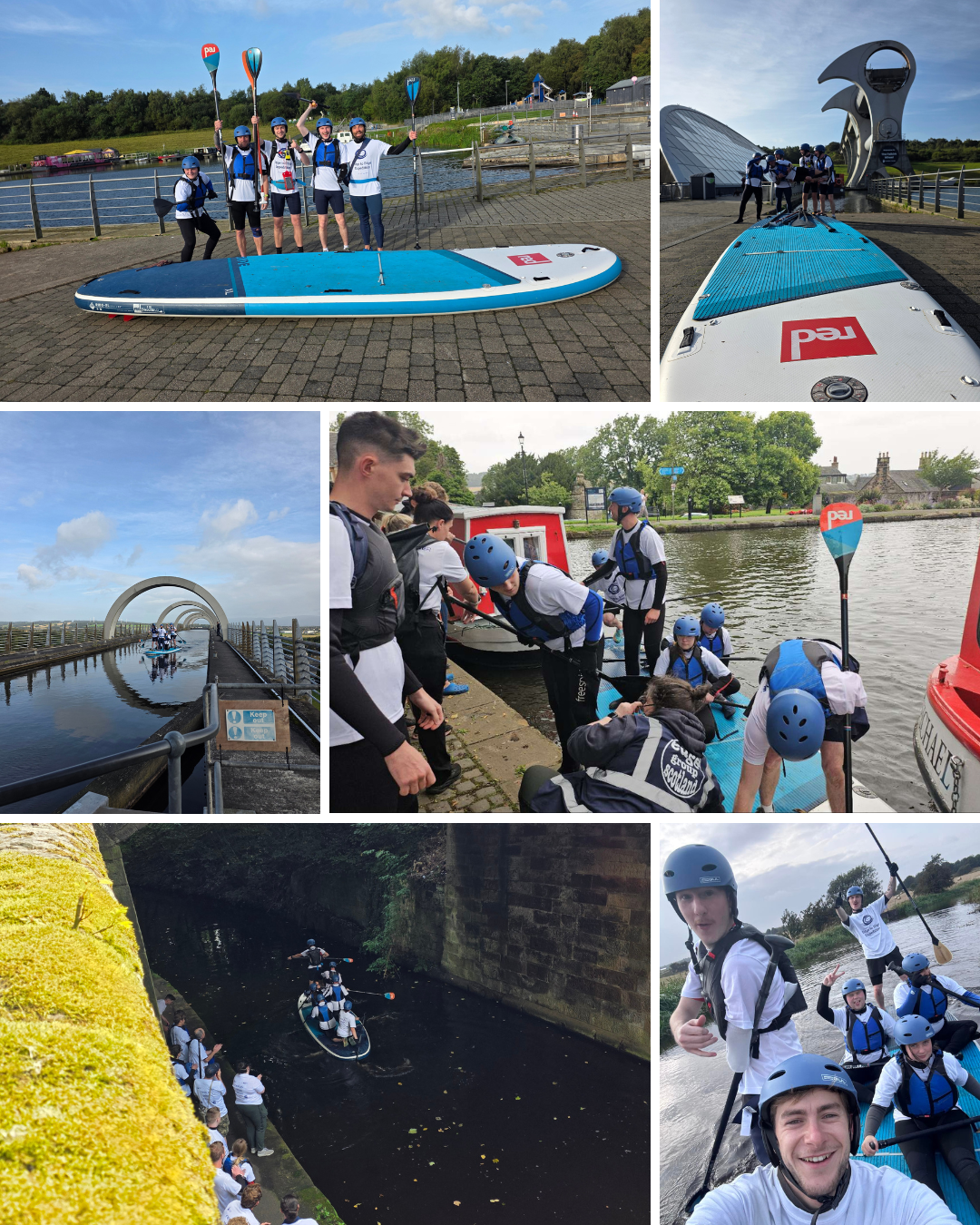Group of people preparing for water sports activities including paddleboarding and kayaking near a river, with a scenic backdrop of bridges, modern architecture, and a cloudy sky.