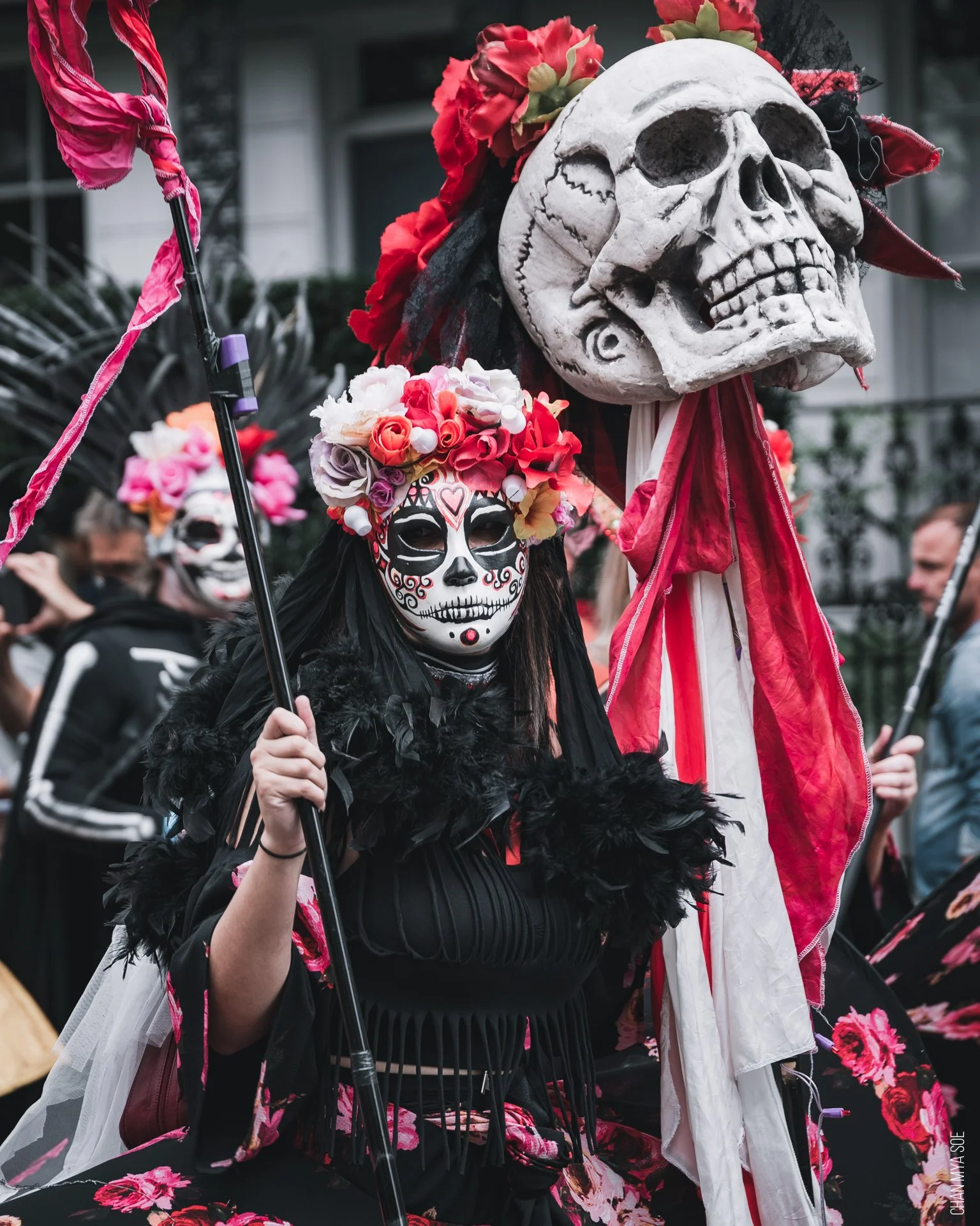 A girl wearing skull mask.jpg