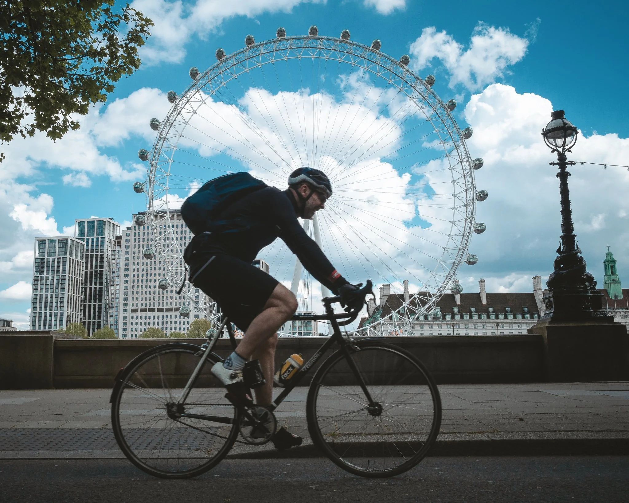 Cyclist with london eye background.jpg