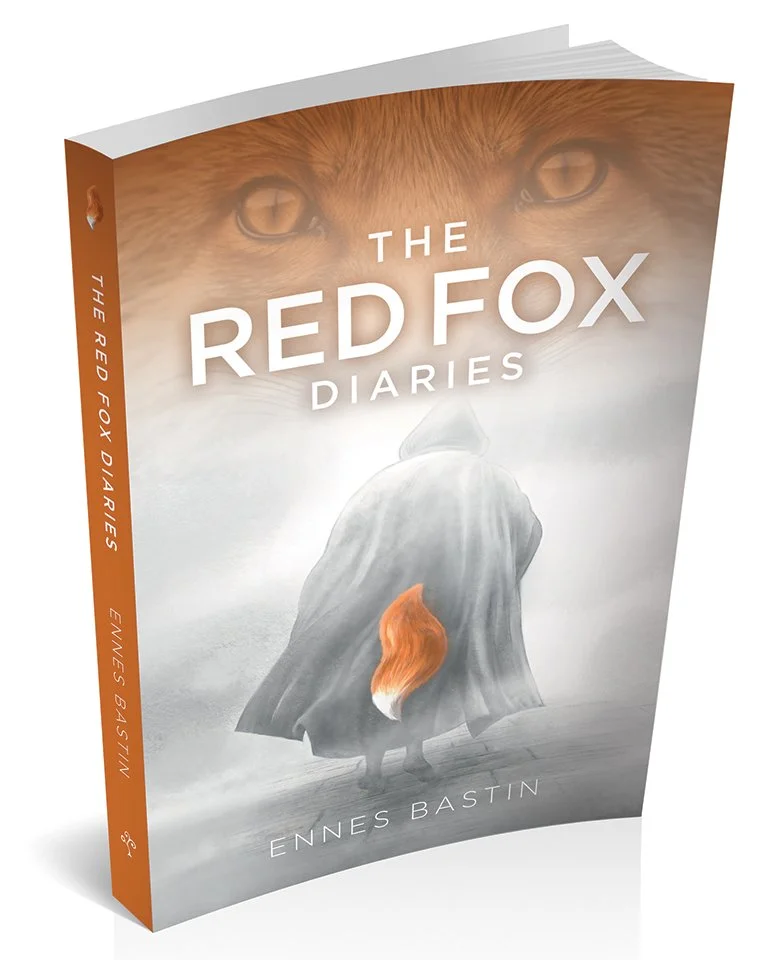 A book illustration featuring a mysterious cloaked figure in the fog walking away down a cobbled street. There is a fox's tail protruding from the back of the cloak.