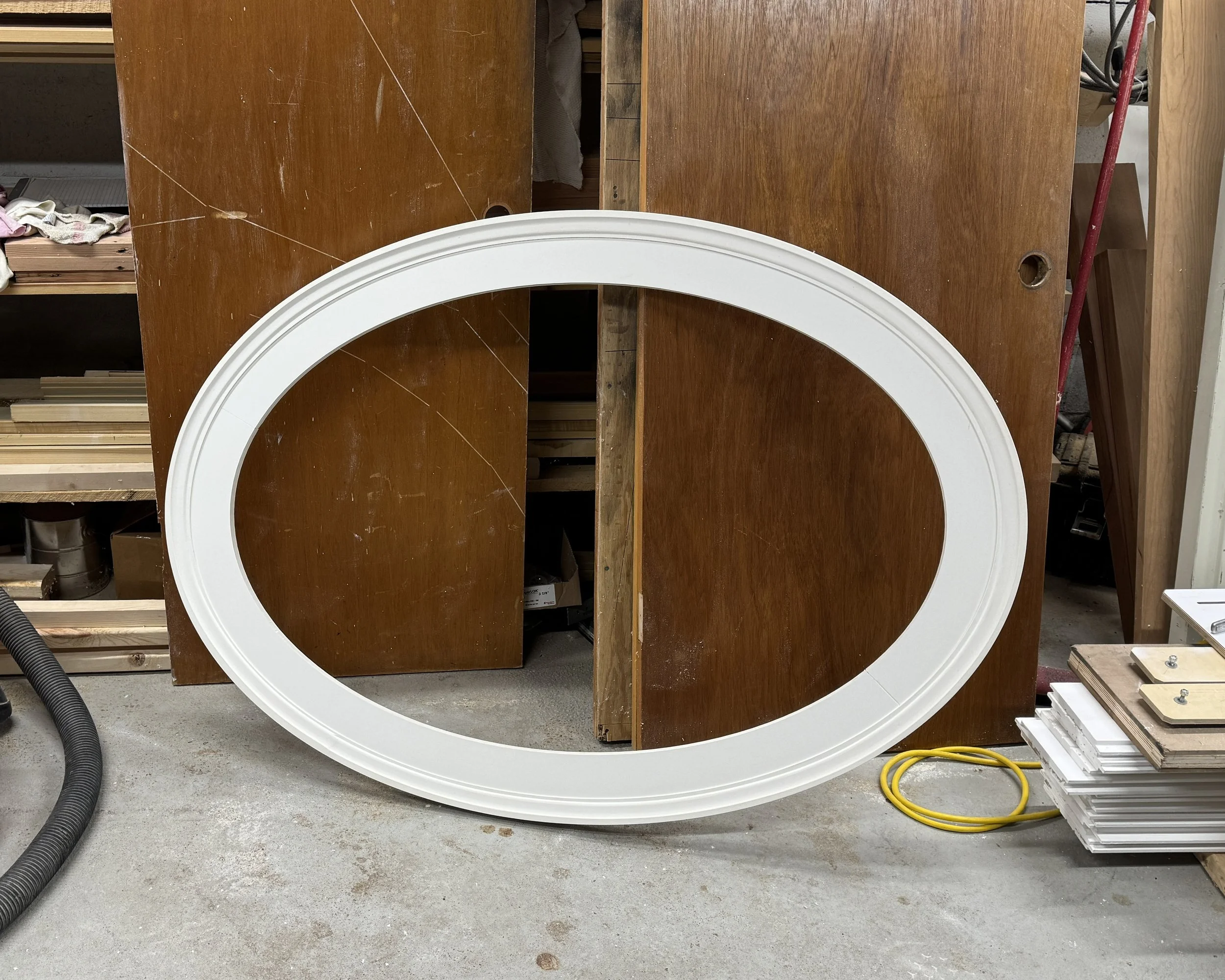 custom-shaped-round-oval-exterior-pvc-window-trim.jpg