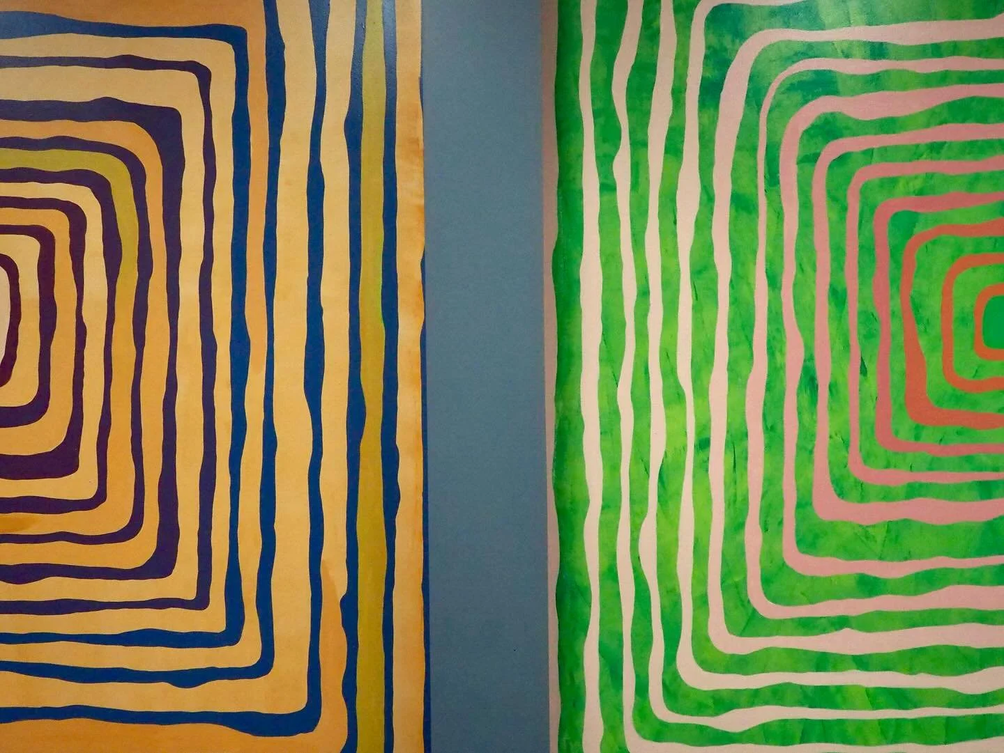 More murals from The Ridge! This large diptych is located in the hallway outside of the ketamine therapy rooms, so I leaned into psychedelic, bold patterns of concentric rings. Inspired by Hundertwasser