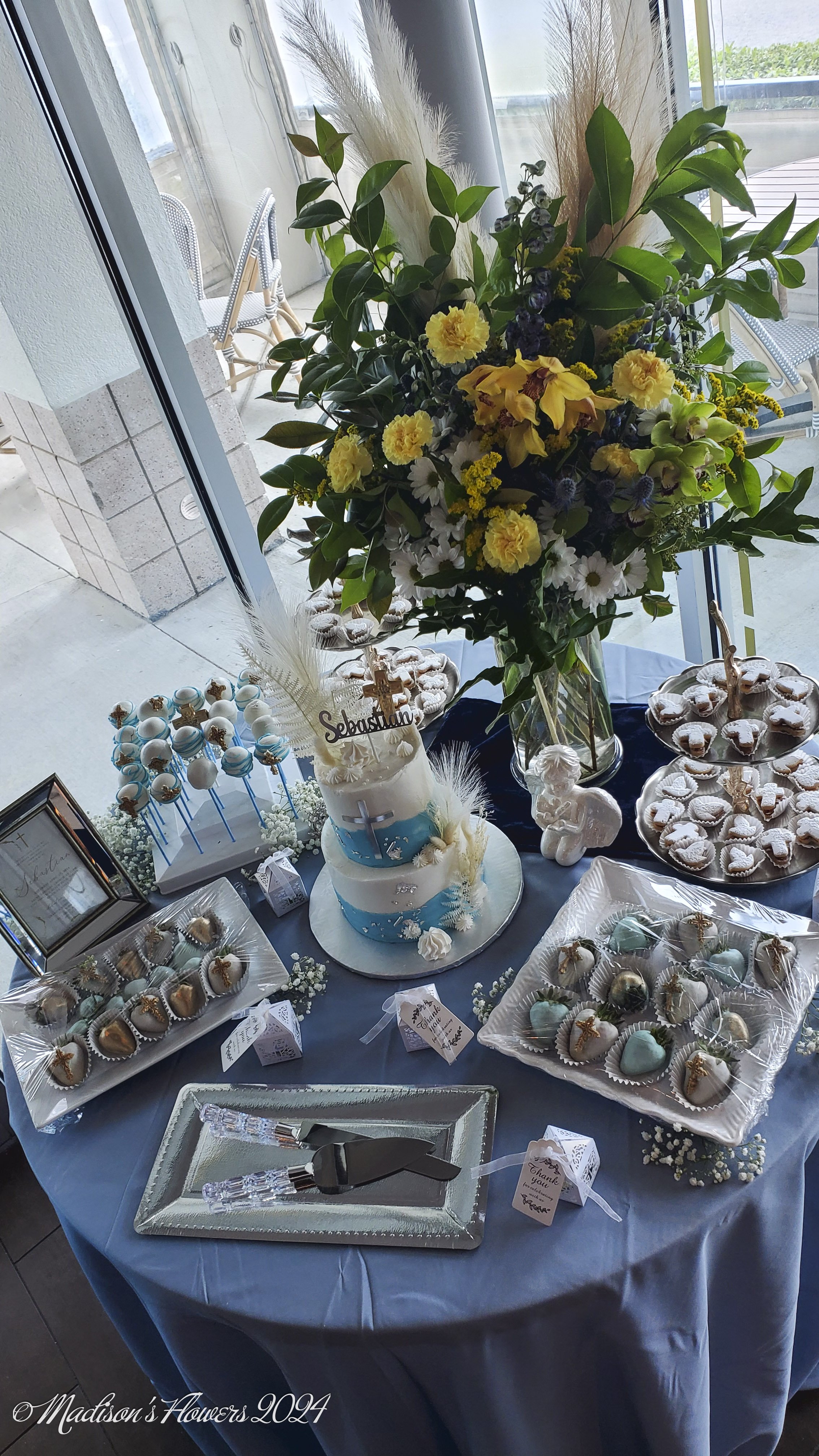 Soft blues, silvers, and golds. Beautiful crystal accents and notes of the sea pull this look together.