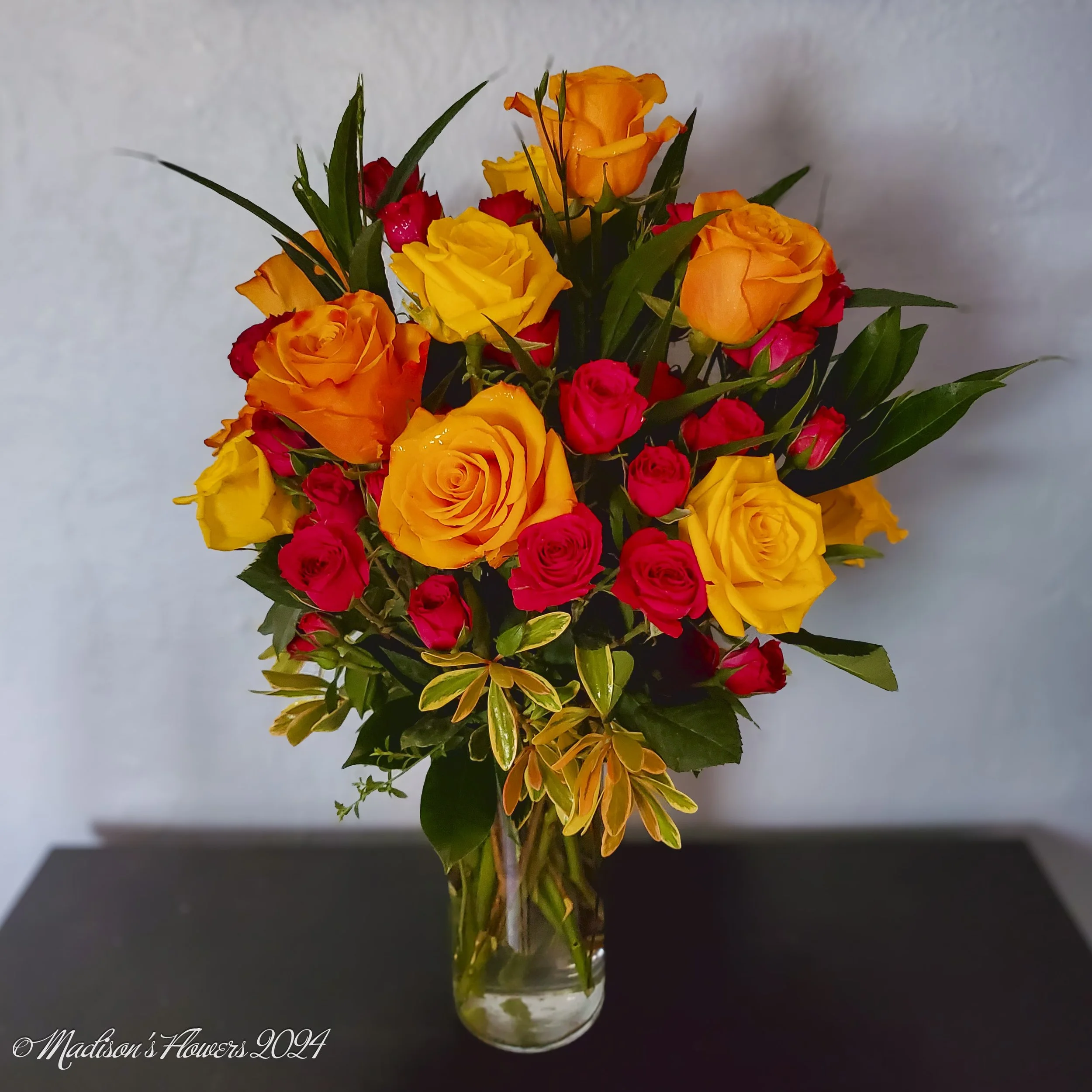 Aloha Roses are perfect to cheer someone up. Send fresh flower from Madison's Flowers today!