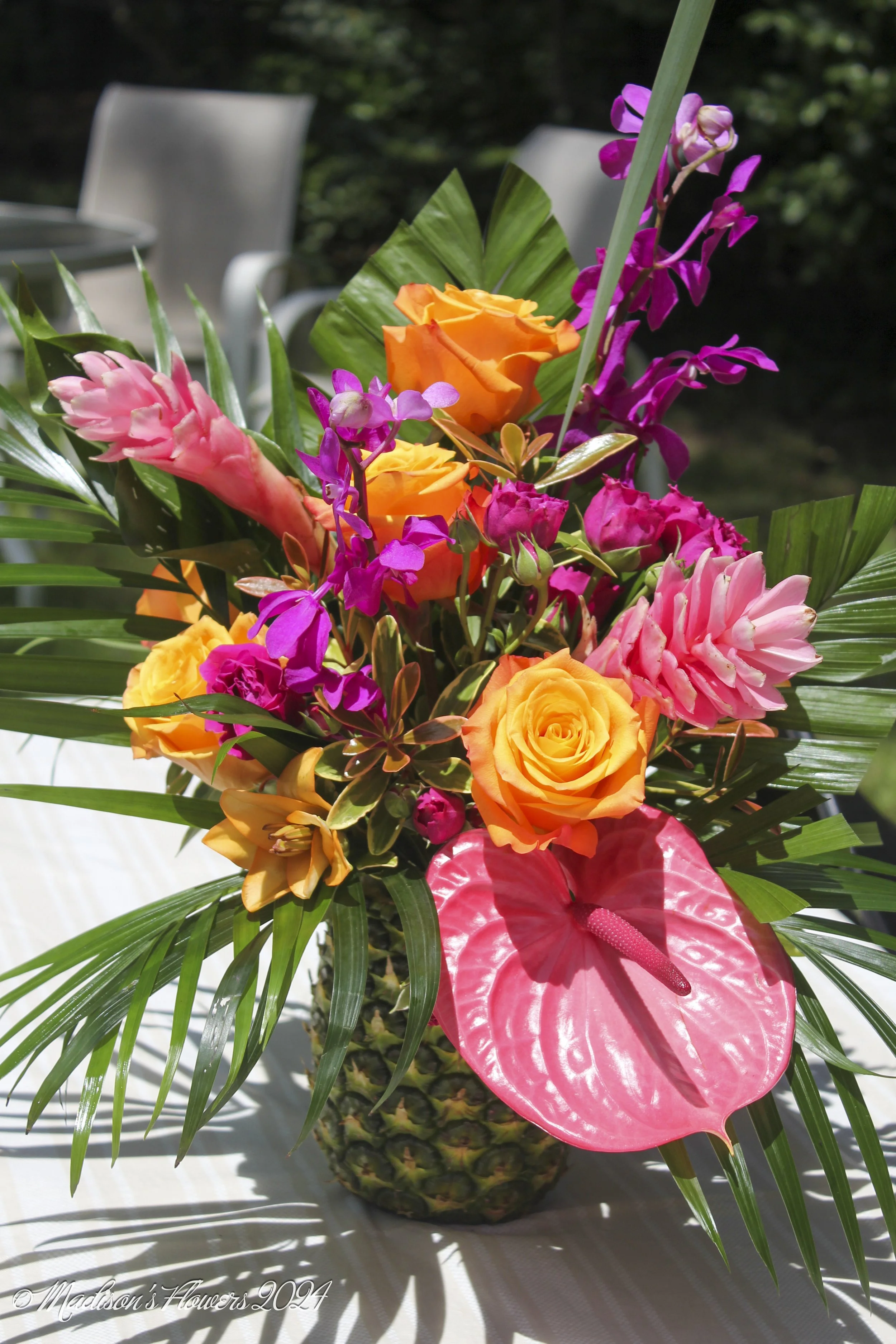 Pineapple vase works perfectly for flower arrangement. 