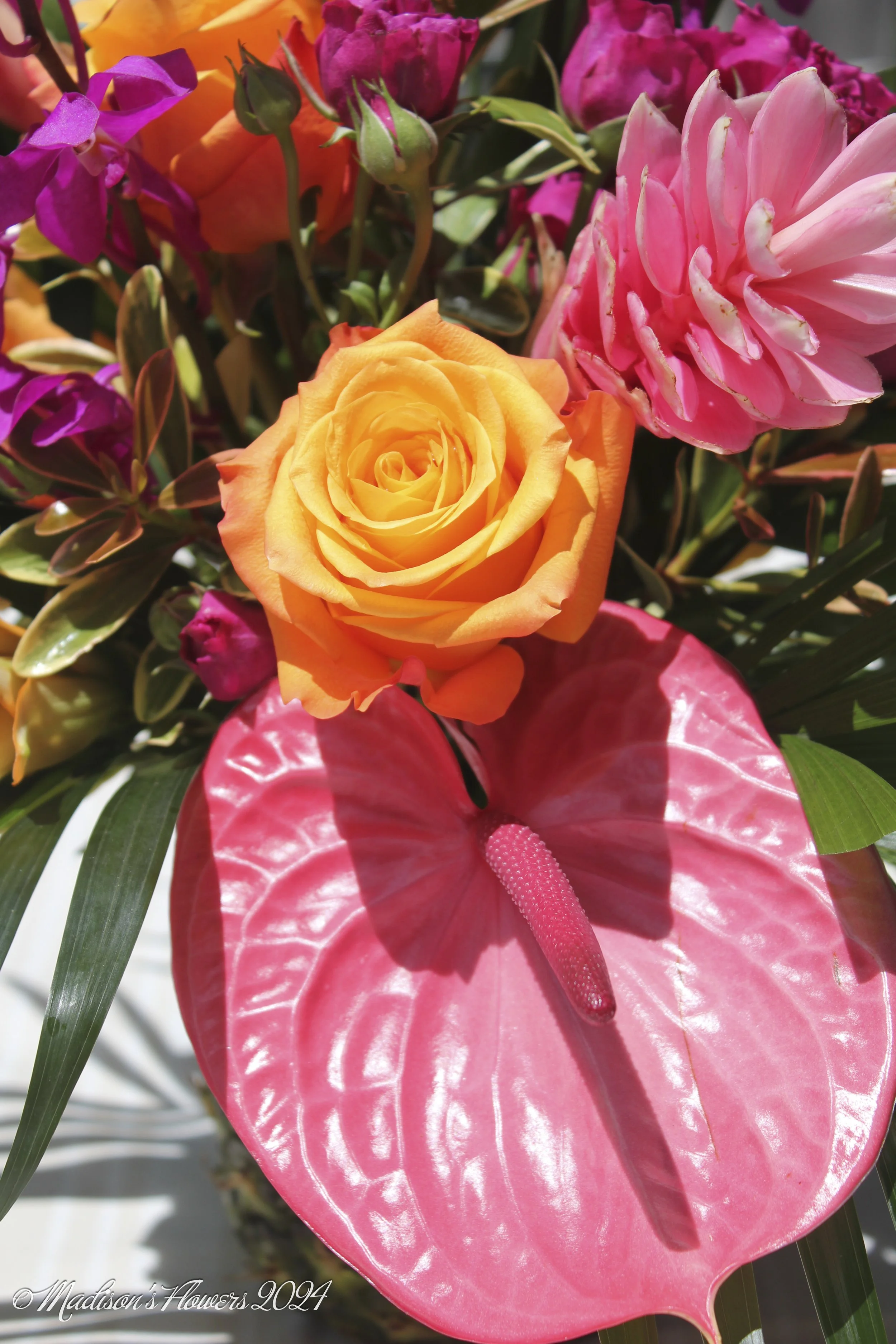 pink anthuriums add flare and interest. 
