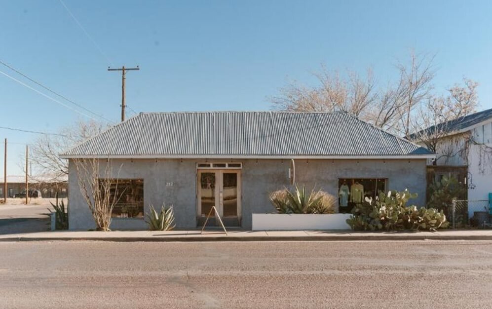 212 E San Antonio St. Commercial zoned retail property with HWY 90 frontage / office &amp; storage space / a 2 Bedroom / 2 Bathroom property with private outdoor kitchen &amp; fire pit / turnkey with elegant modern updates / heating / cooling $1,200,