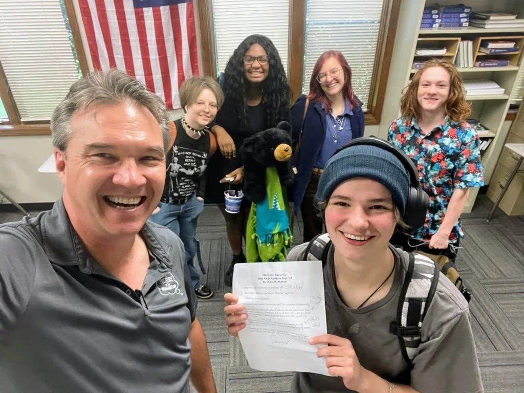 Drama teacher Miles with his high school drama students