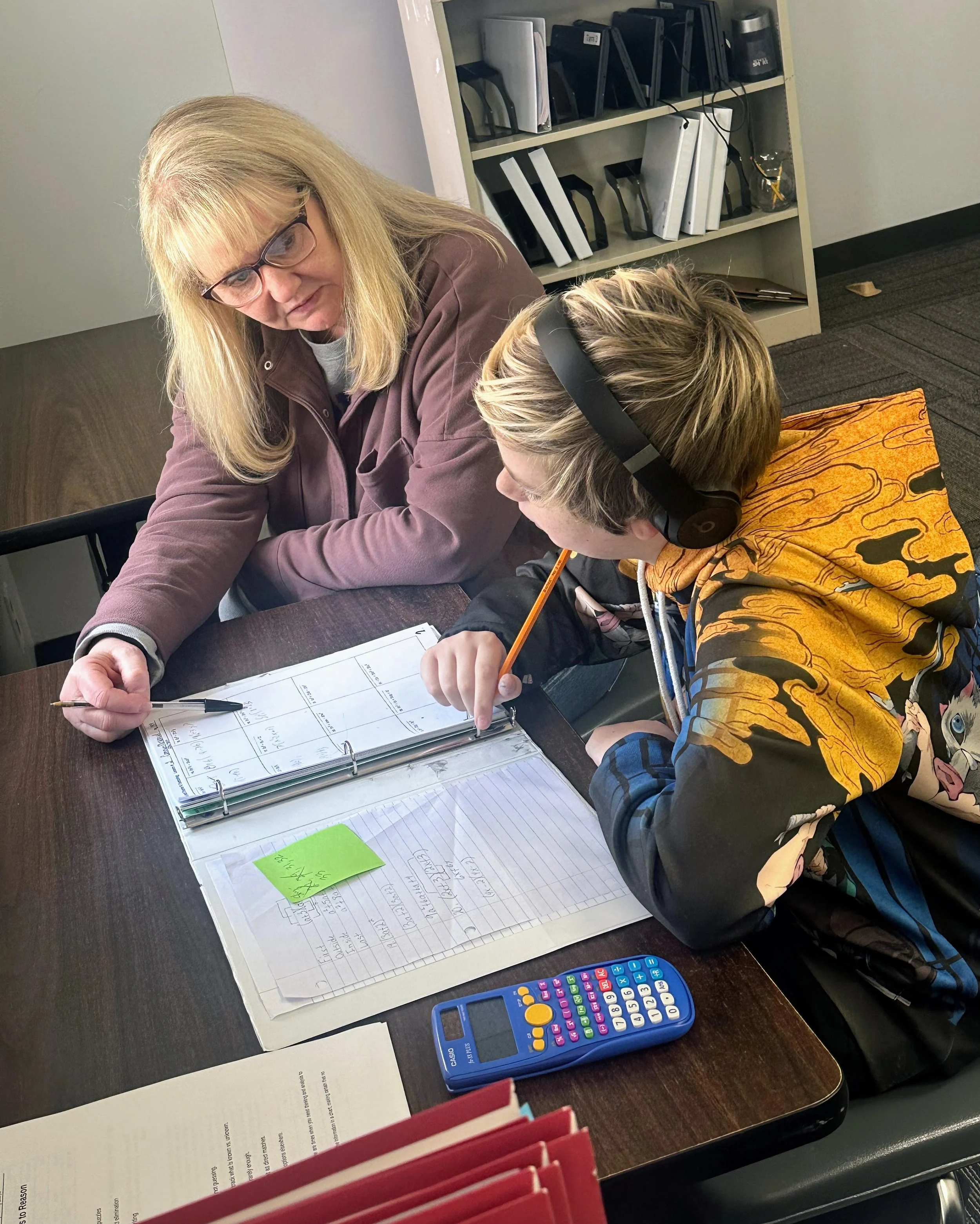 Math teacher Tami works with a student