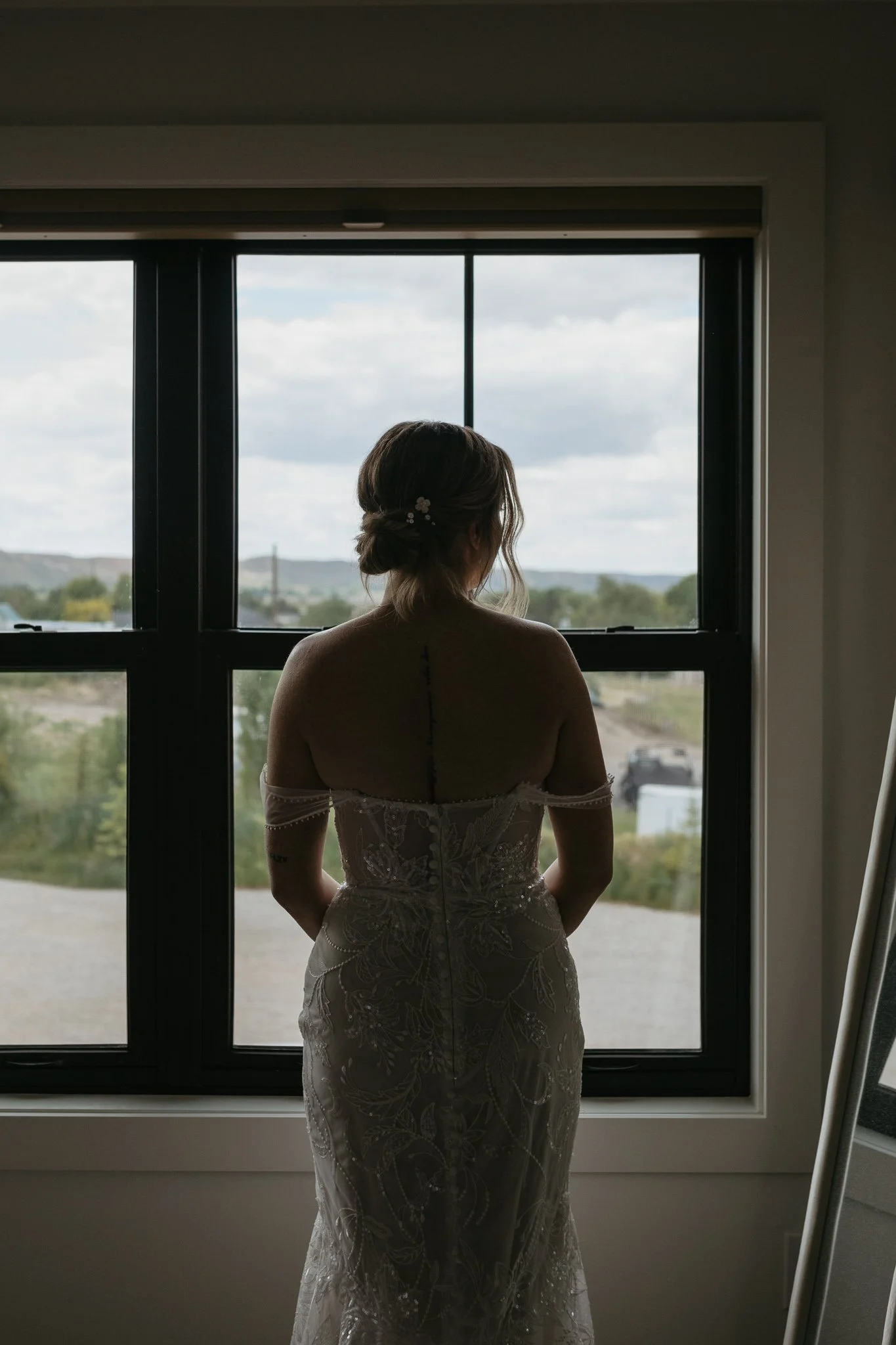 Bride getting ready on wedding day.