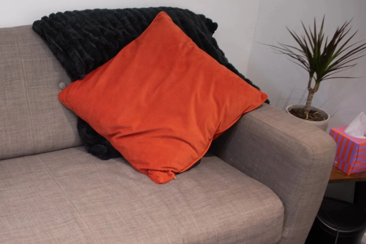 Enchanted Circle, Attleborough Norfolk. Psychotherapy couch, Hypnotherapy  couch and theray couch with a comfortable orange pillow and cozy blanket.