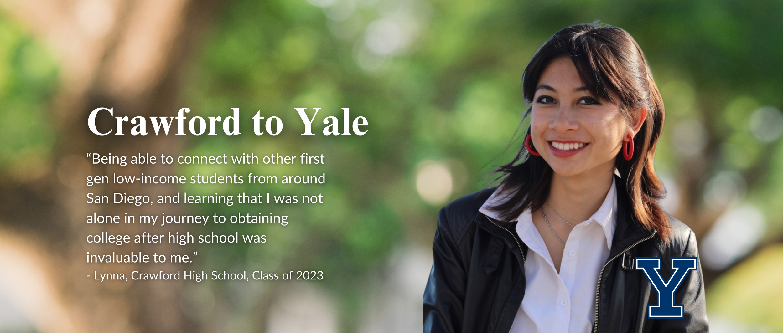 Young woman smiling outdoors with trees in the background, wearing a white shirt and black jacket, with red earrings and Y logo in the bottom right corner.