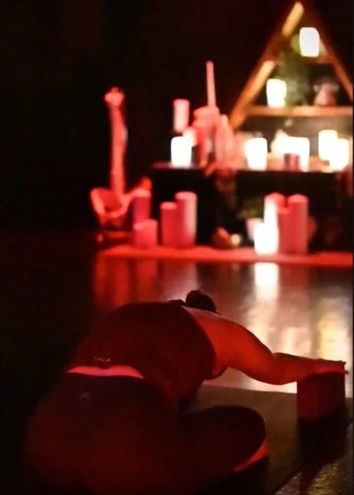 Student Practicing Restorative Yoga in the Atmospheric Destroyer Yoga Studio at the Kali Collective