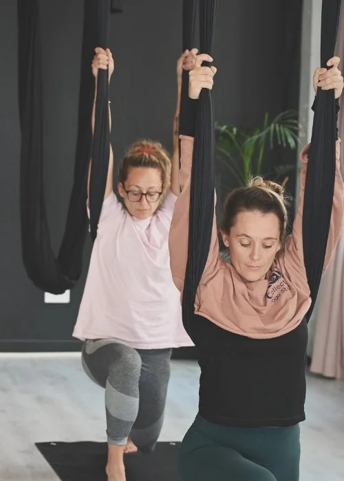 Aerial yoga beginners class at the Kali Collective