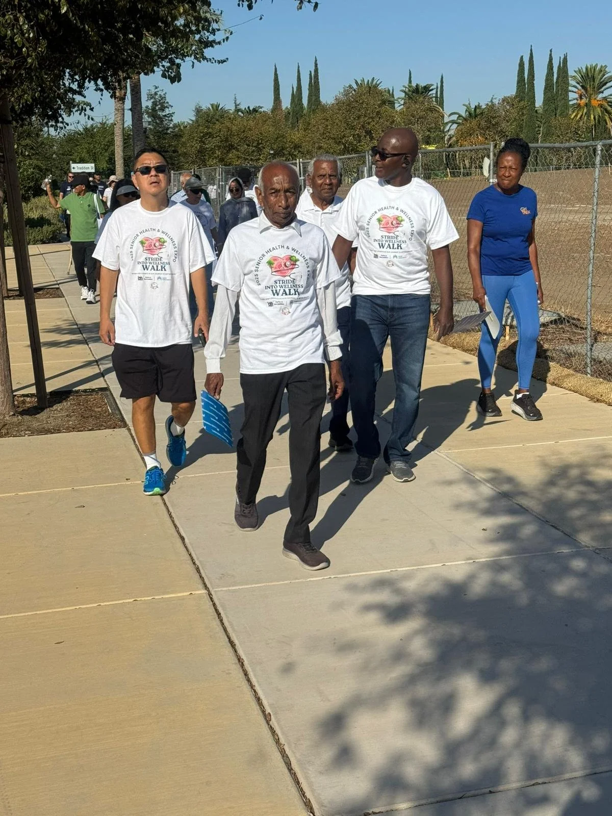 Patrice Koffi accompanied by Dr. Andy Su, Mayor of Mountain House during the 2025 Senior Health & Wellness Expo.