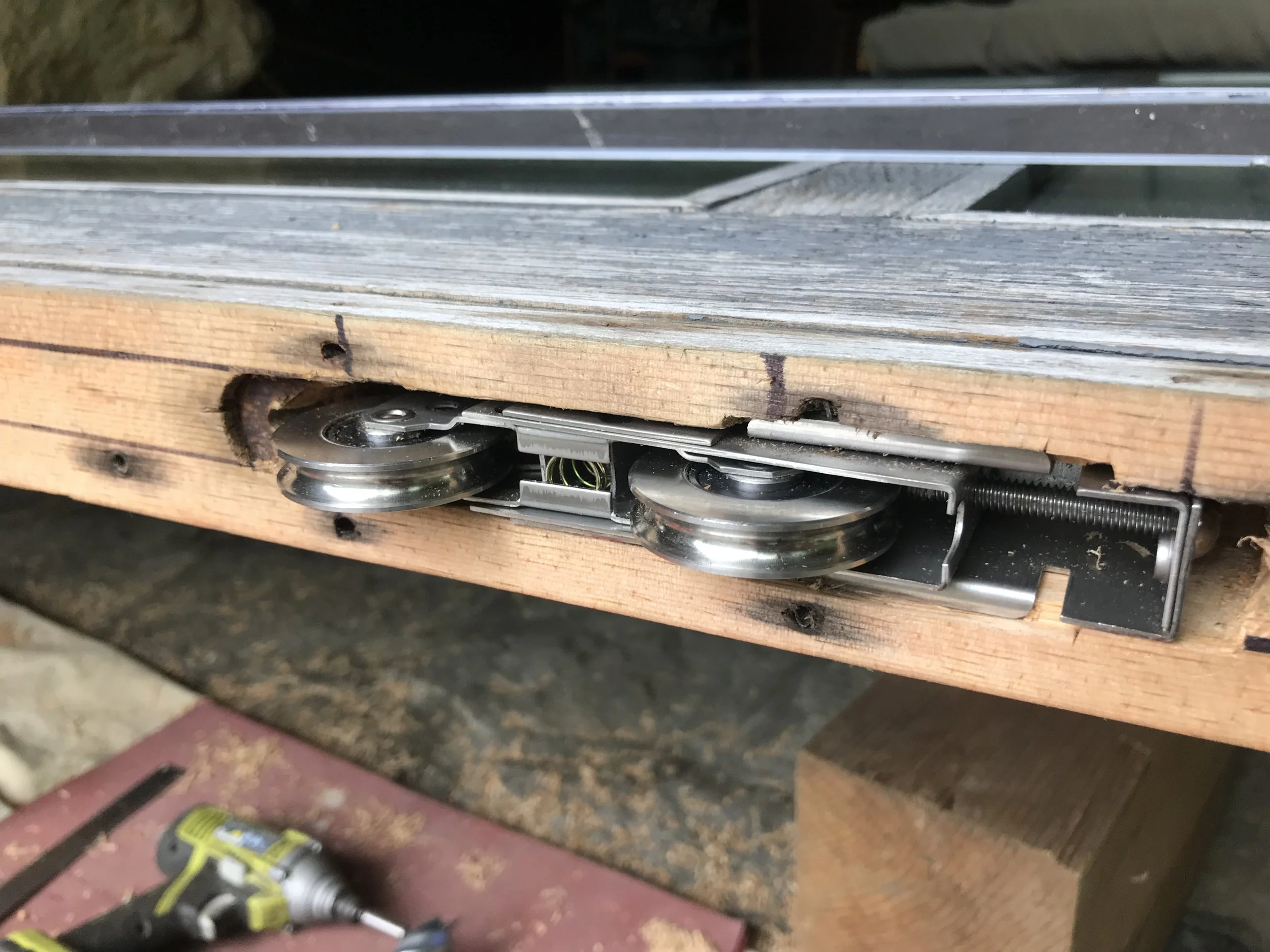 Track being fit in Living Room Door.jpeg