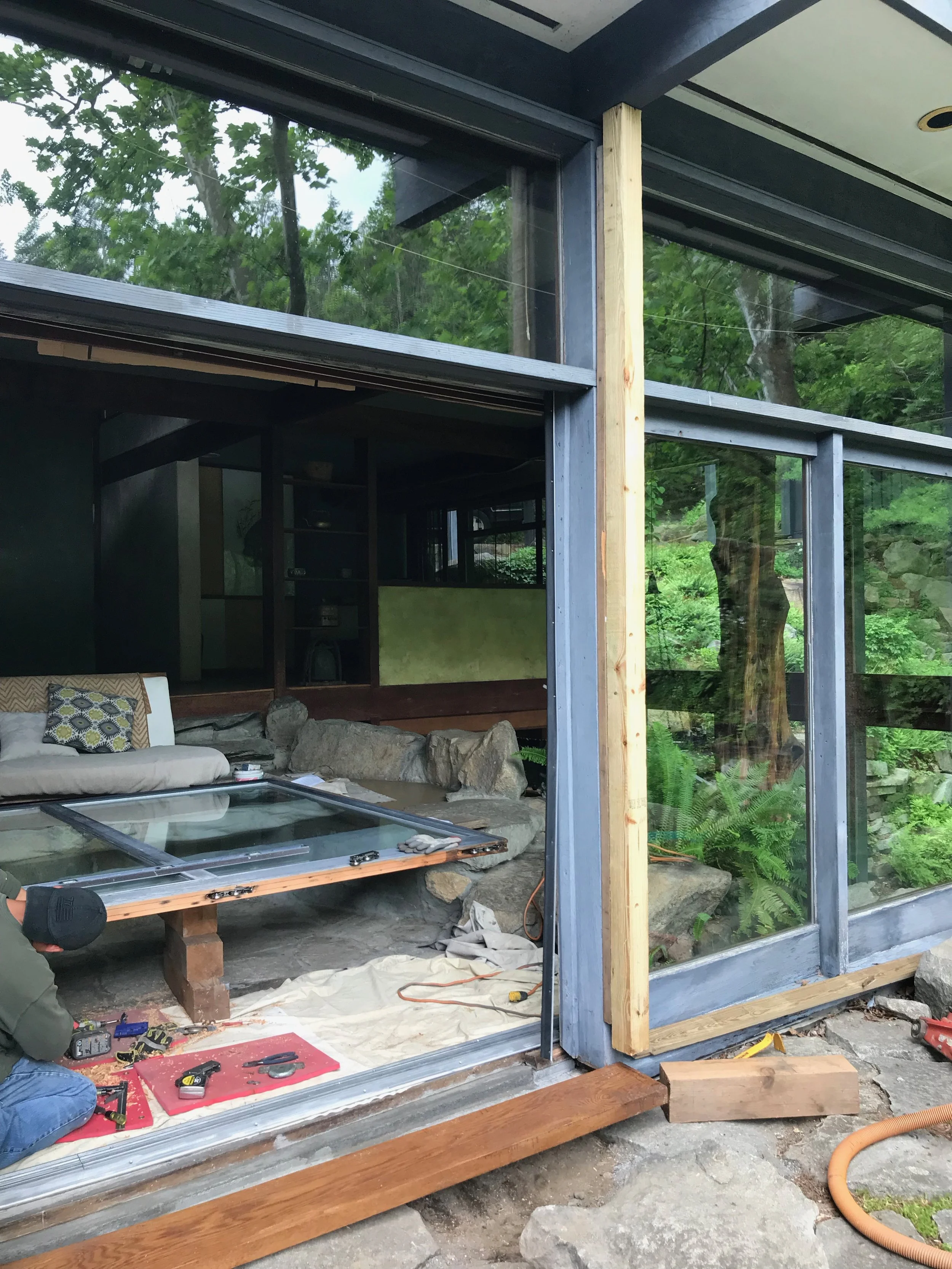 Tracks Being Installed in Living Room Door.jpeg