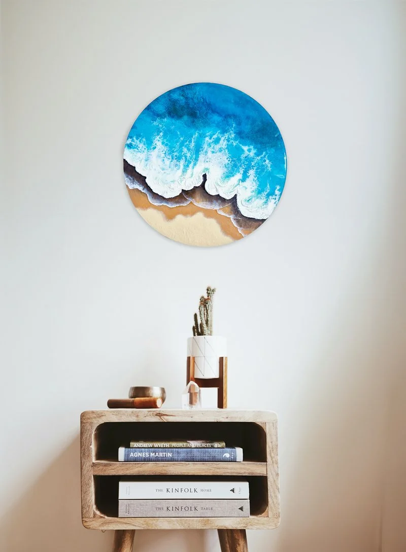 Discover "Ocean's Caresss," a handcrafted resin artwork showcasing vibrant emerald and aqua tones. Perfect for creating a serene coastal inspired interiorin your space.