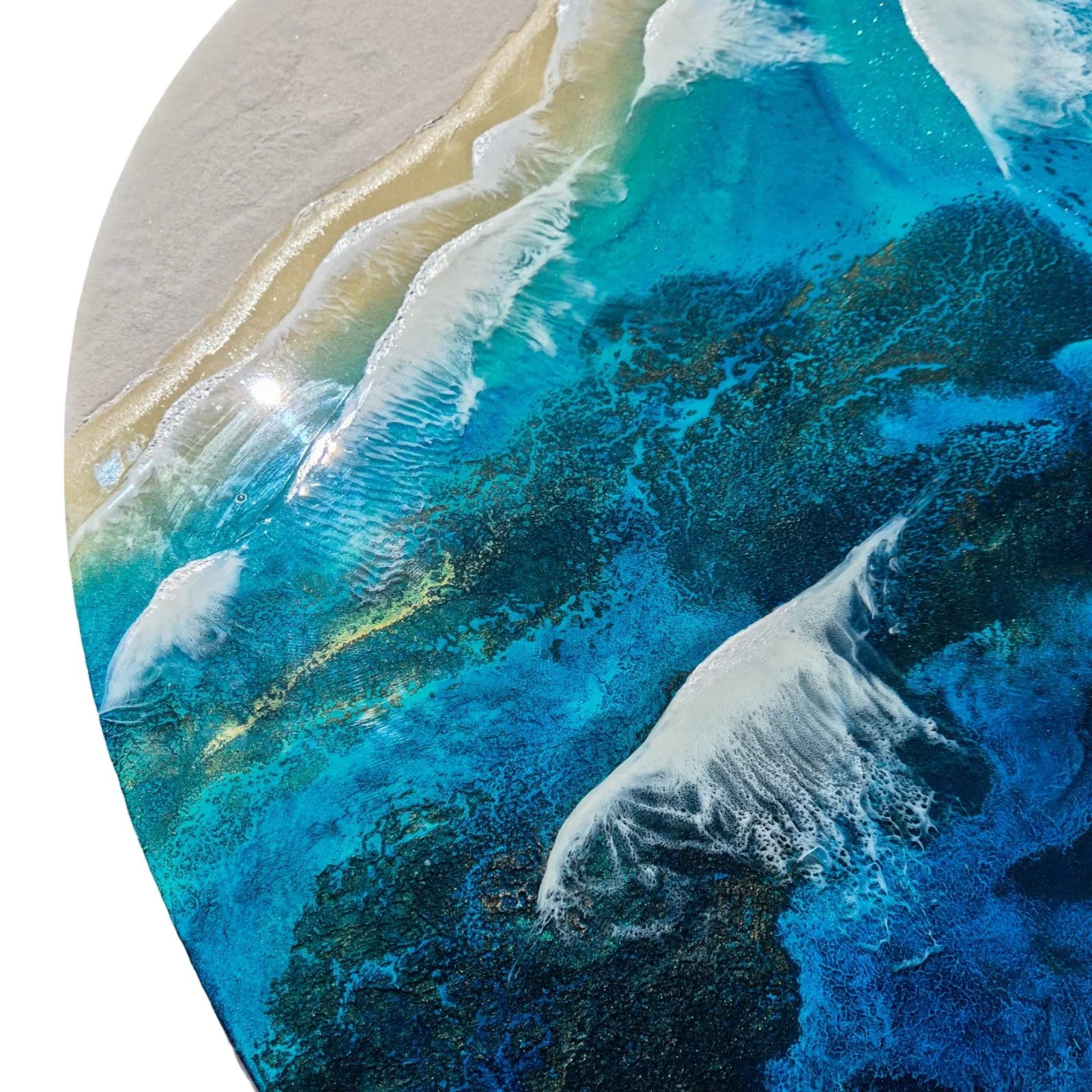 Large round resin artwork with swirling blue ocean textures and sandy shoreline, featuring a high-gloss finish on wood panel.