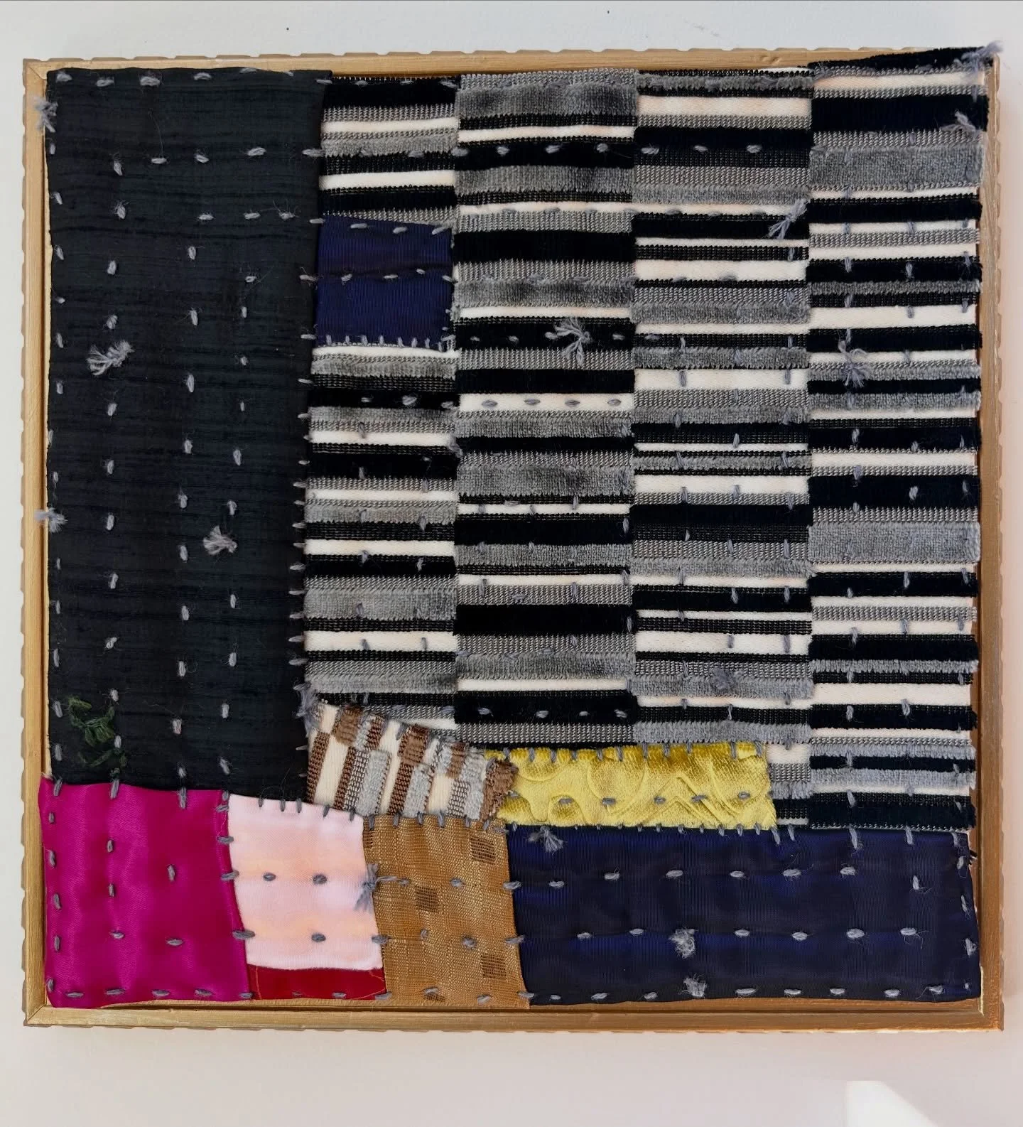 Moonbeam
12.5&rdquo; x 12.5&rdquo; x 1.5&rdquo;
textiles from fine furniture makers, silk, wool &amp; silk yarn, frame

The moon is out tonite shining down her moonbeams on the village and sea. An eclectic collage of textures in this hip mod work. A 