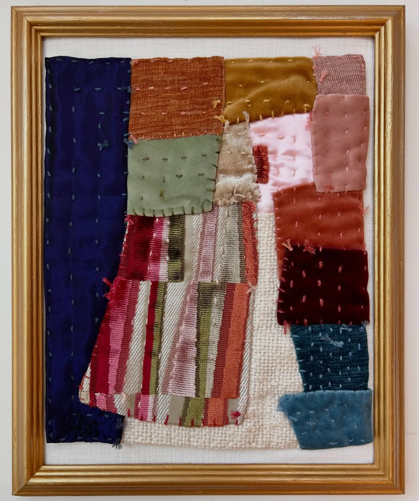 Line Dry
12.5&rdquo; x 15.5&rdquo; x 1.5&rdquo;
velvet, silk, wool &amp; silk yarn, frame

Line Dry is a small hand stitched art quilt reminiscent of colorful sheets line drying on a beautiful breezy day.  In keeping with my promise in the new year t
