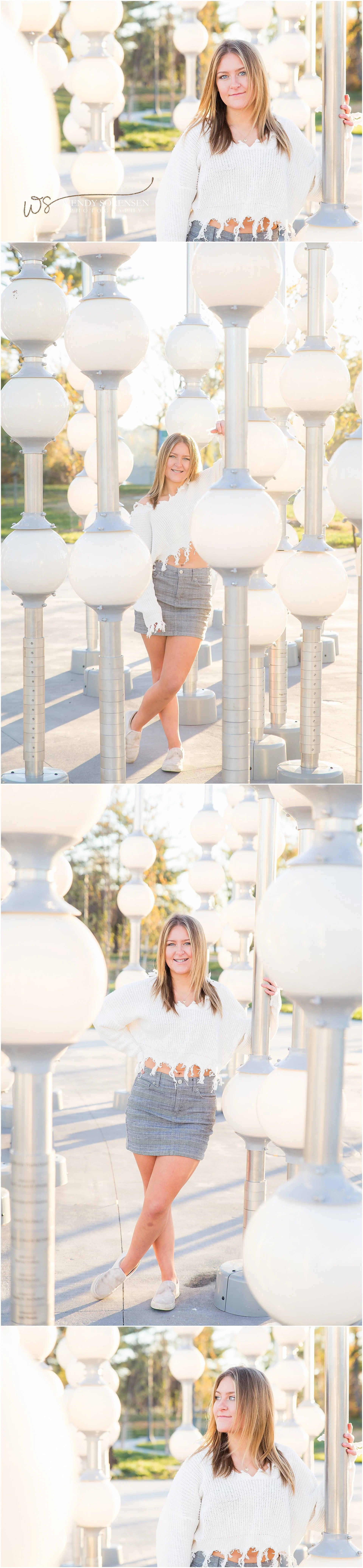 Senior girl posing near a light sculpture at Water Works Park in Des Moines.