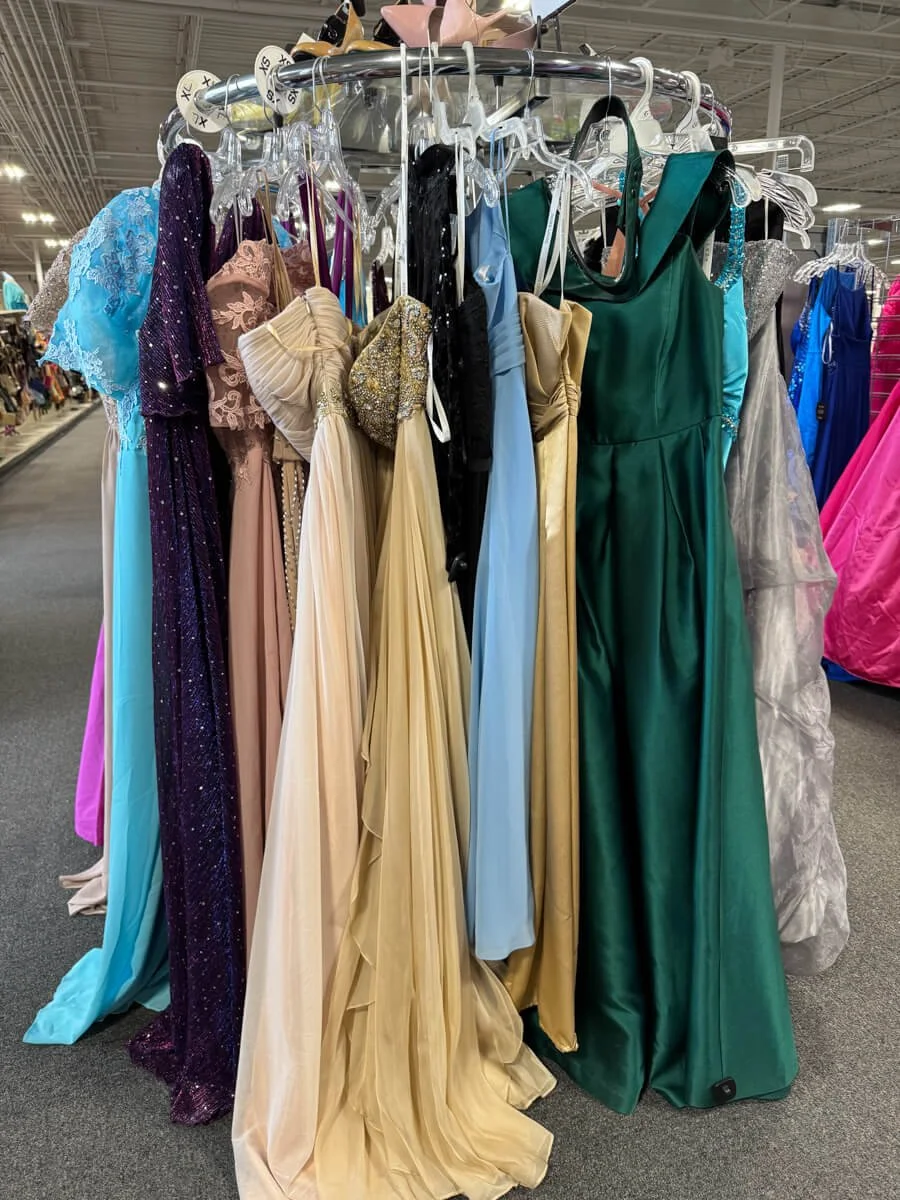 Round rack of used prom dresses at Stuff Etc in Clive, Iowa.