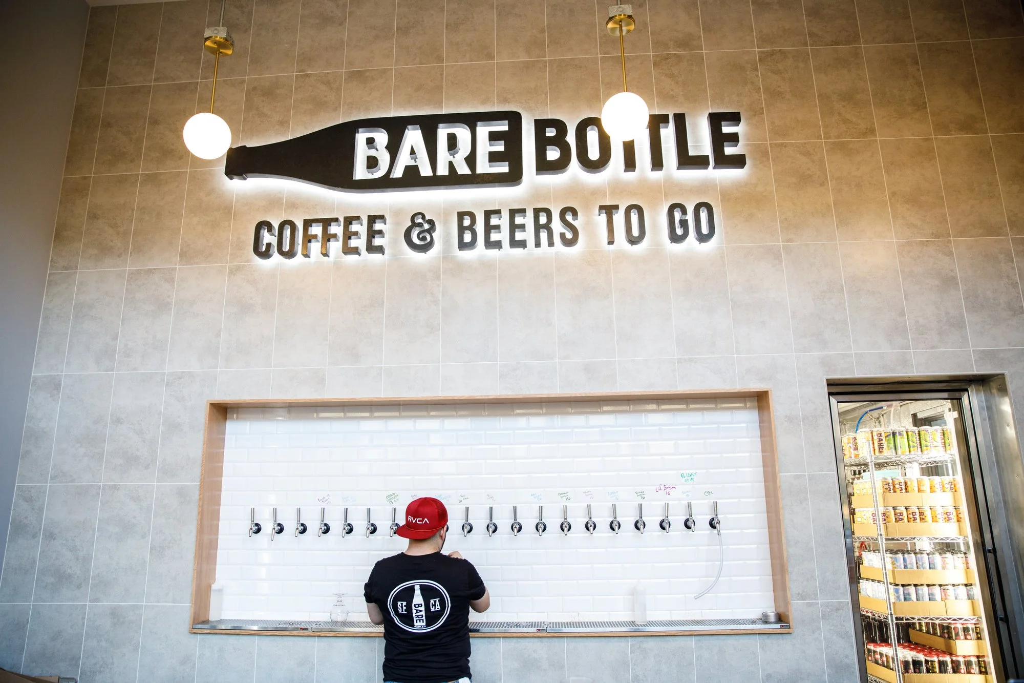 Bartnder pouring a beer at our Santa Clara taproom