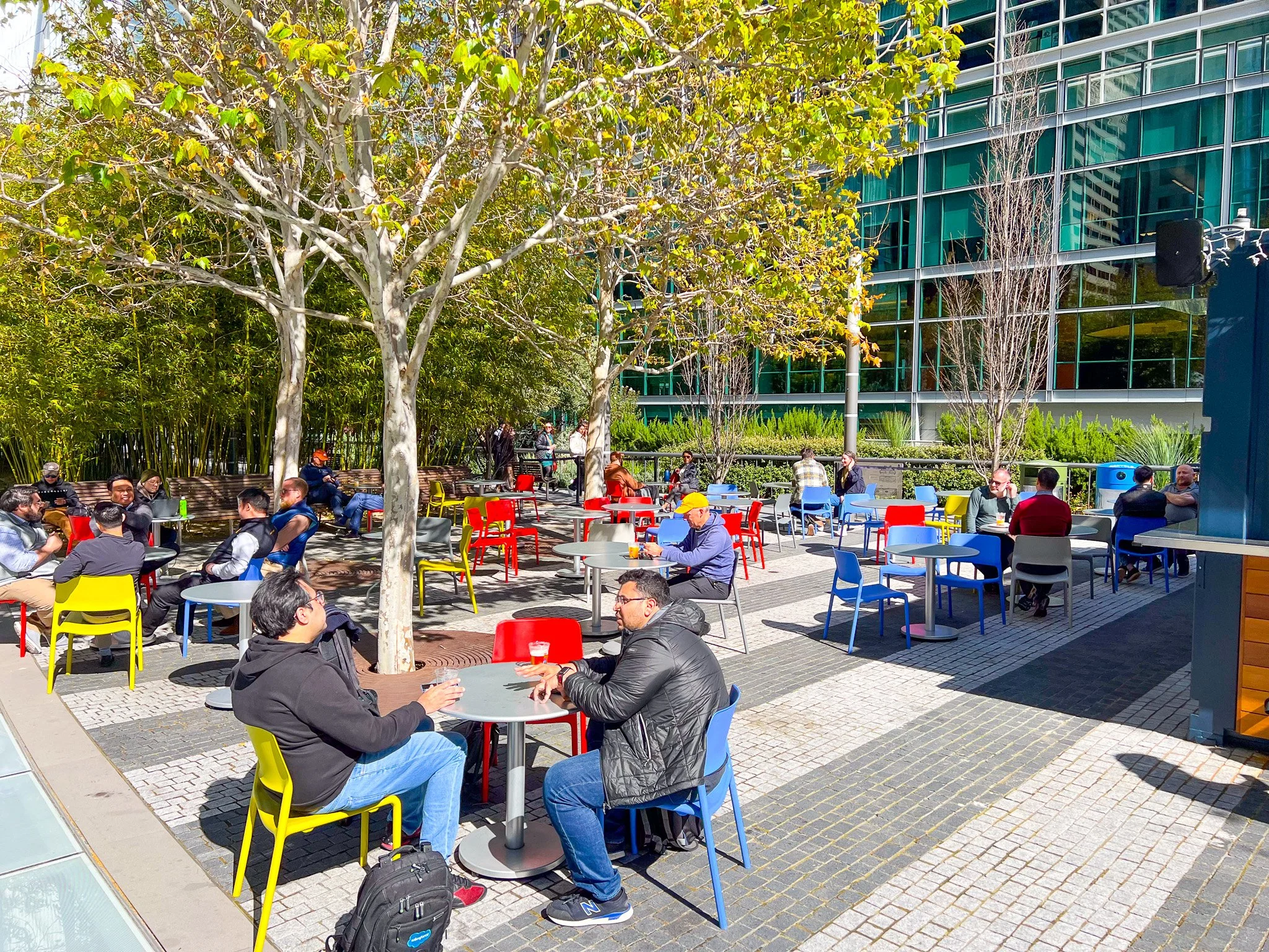 People sitting at our Salesforce Park beer garden