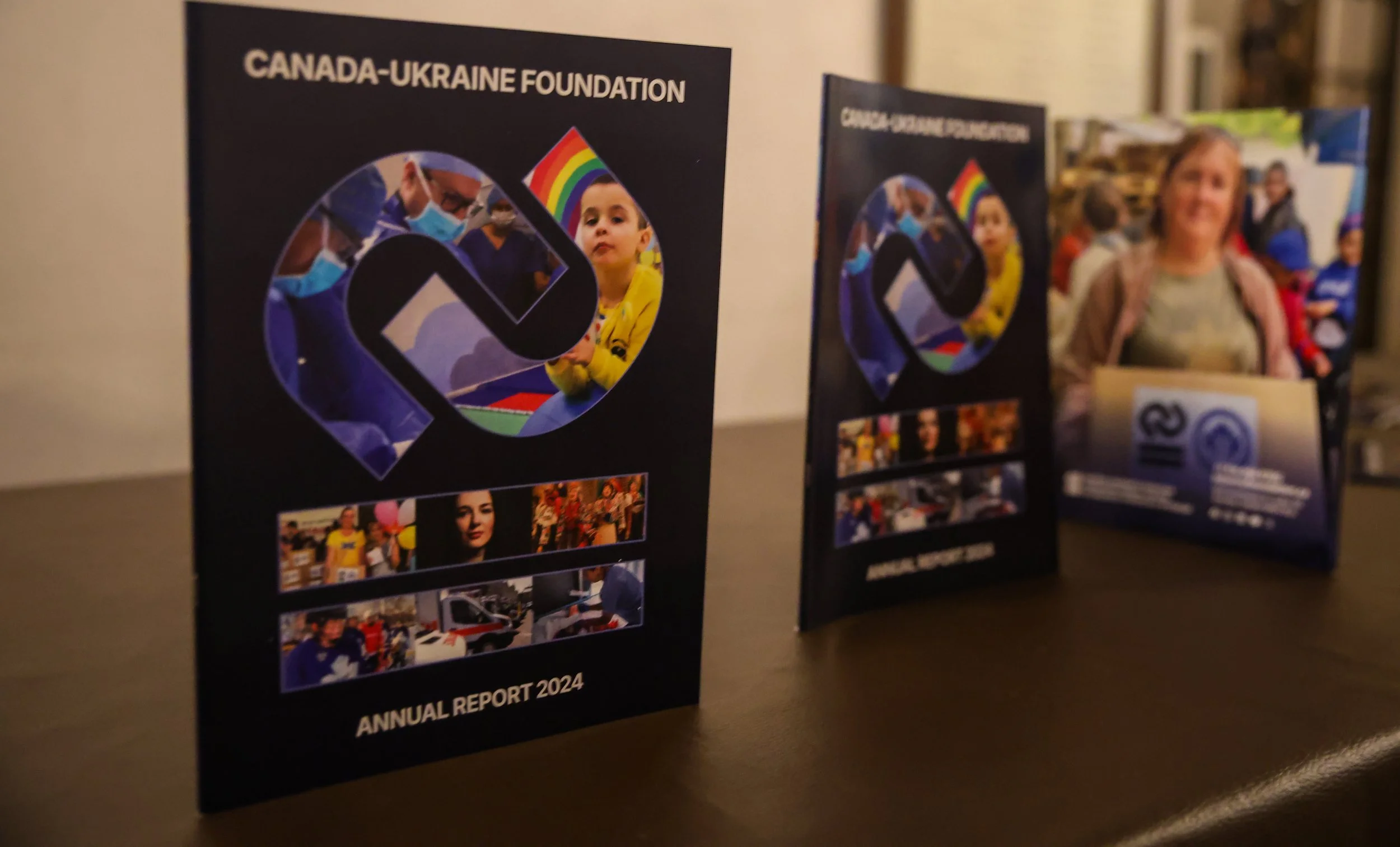 Canada Ukraine Foundation annual report standing on a table