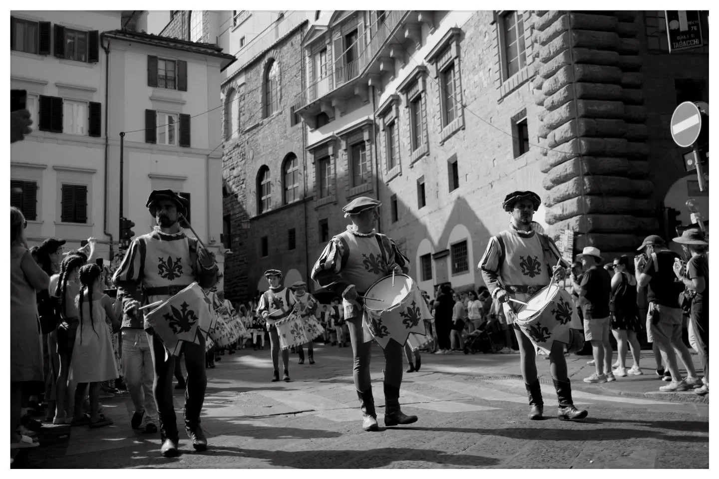 If you are in Florence in June, catch a game of giuoco del calcio fiorentino. 

Florence plays yearly and has been since the middle ages. Carving the city into 4 teams for one of the most strategic and violent games, we ran into this parade coming ou