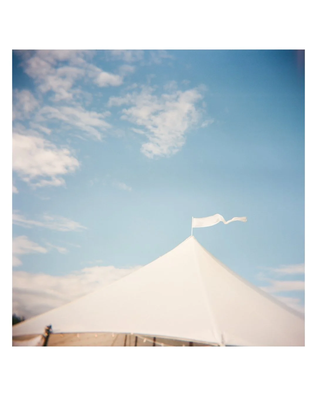 Tented summer wedding on Lake Winnipesaukee!