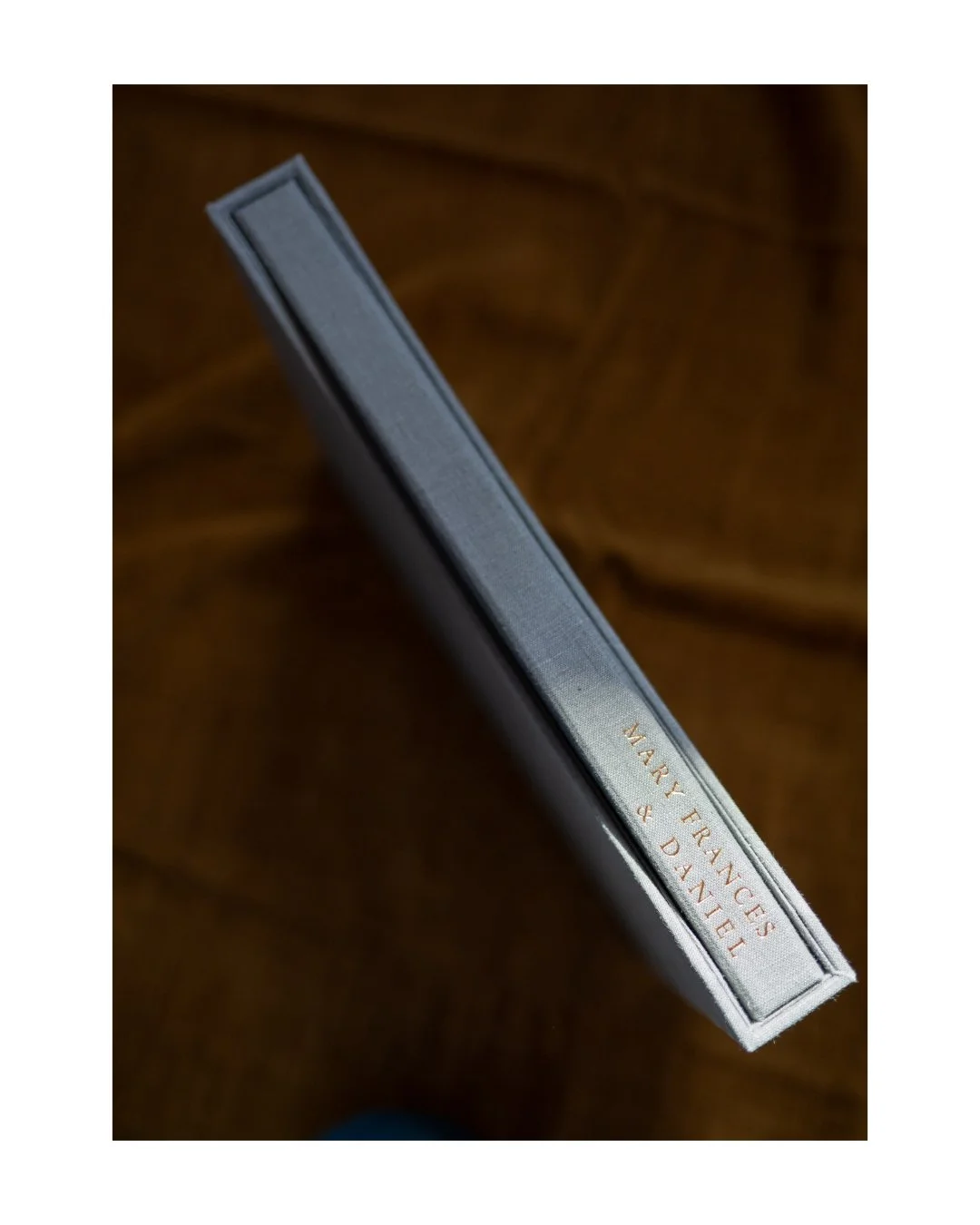 I love incorporating design details like custom patterns and designs into my albums. This 11x14 inch album features a protective slipcase, custom endpapers, and matte handpressed pages.