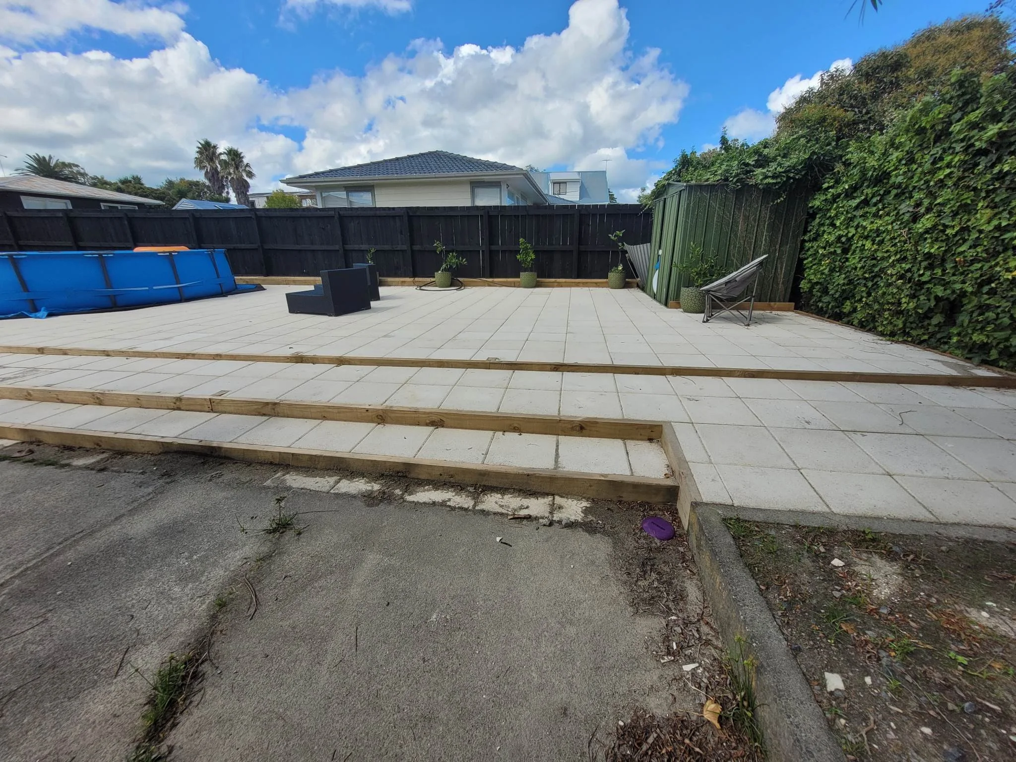 3 steps of paved patio