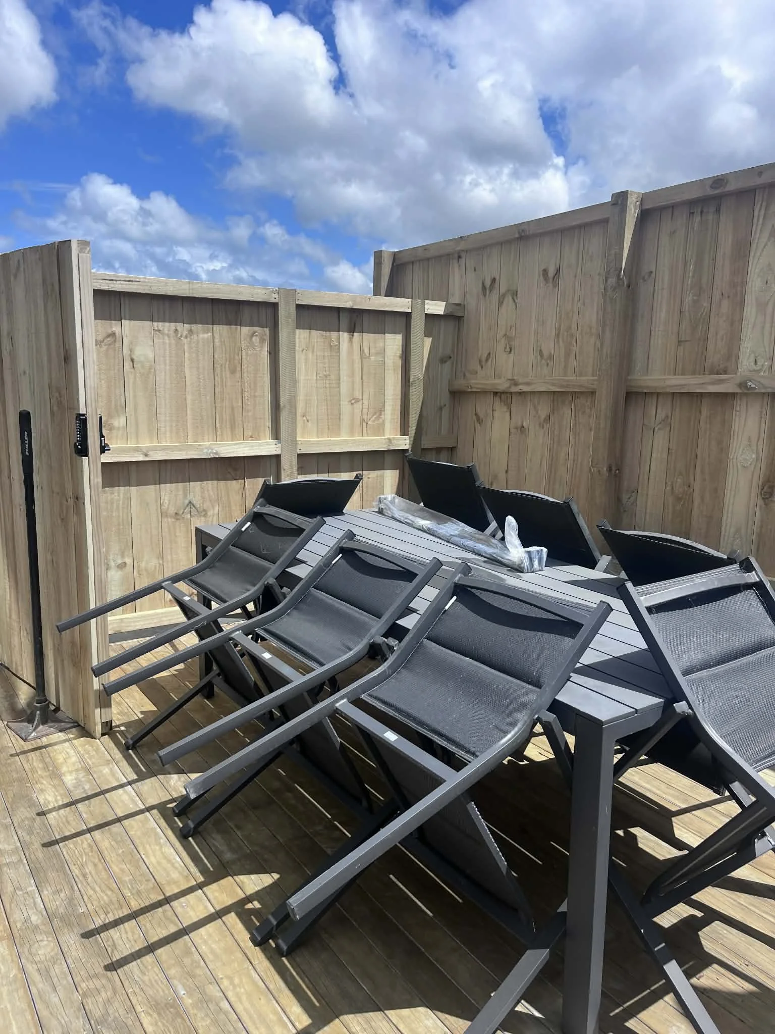 New fencing with decking furniture